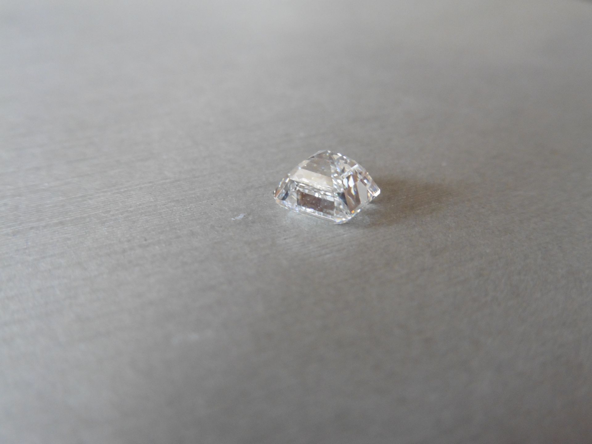 2.00ct single asscher cut diamond. Measurements 6.78 x 6.62 x 4.77mm. E colour and VS1 clarity.