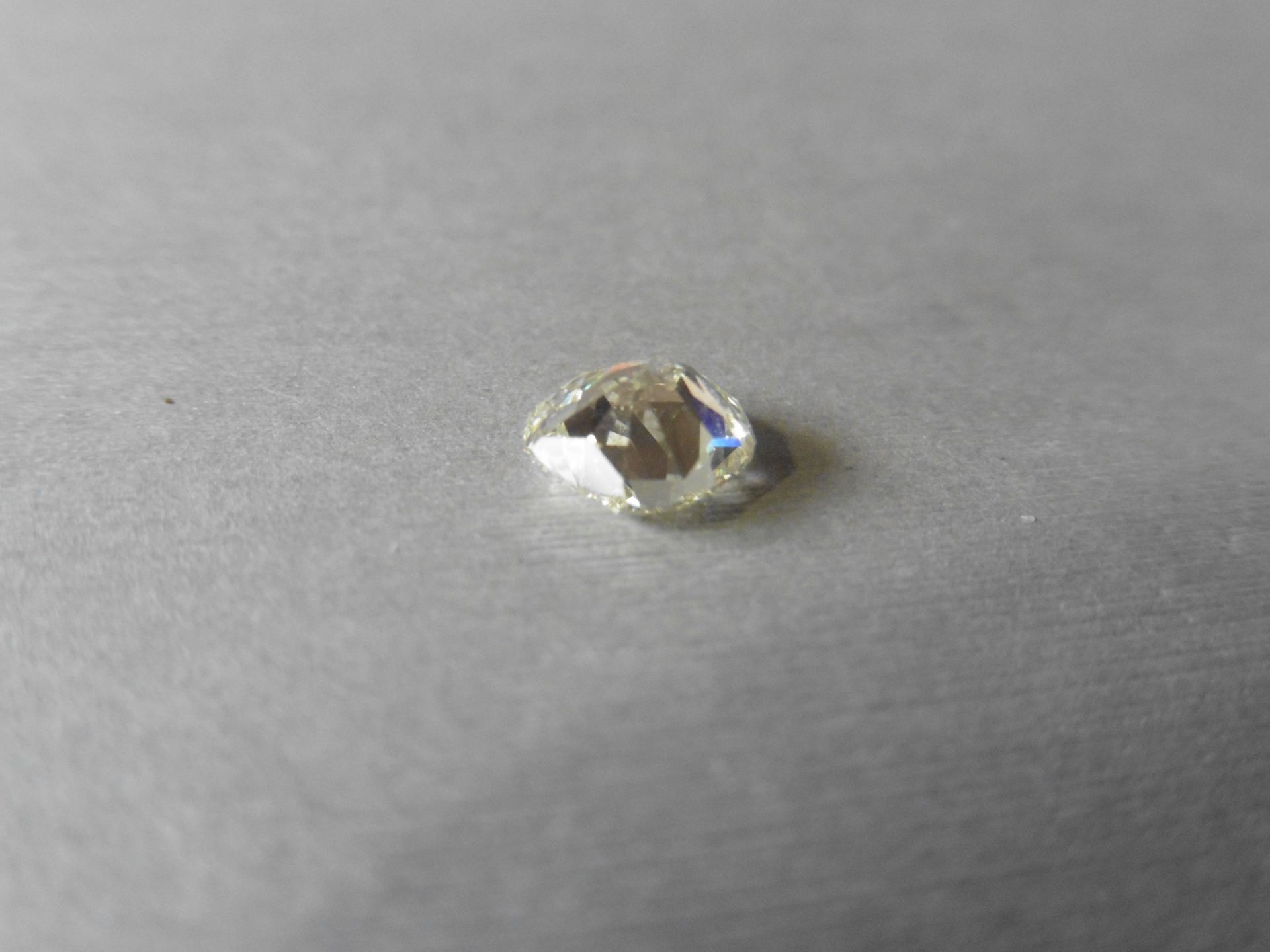 1.33ct loose cushion cut diamond. Fancy yellow colour ( y-z) VVS2 clarity. 6.59 x 6.32 x 3.79mm. - Image 2 of 4