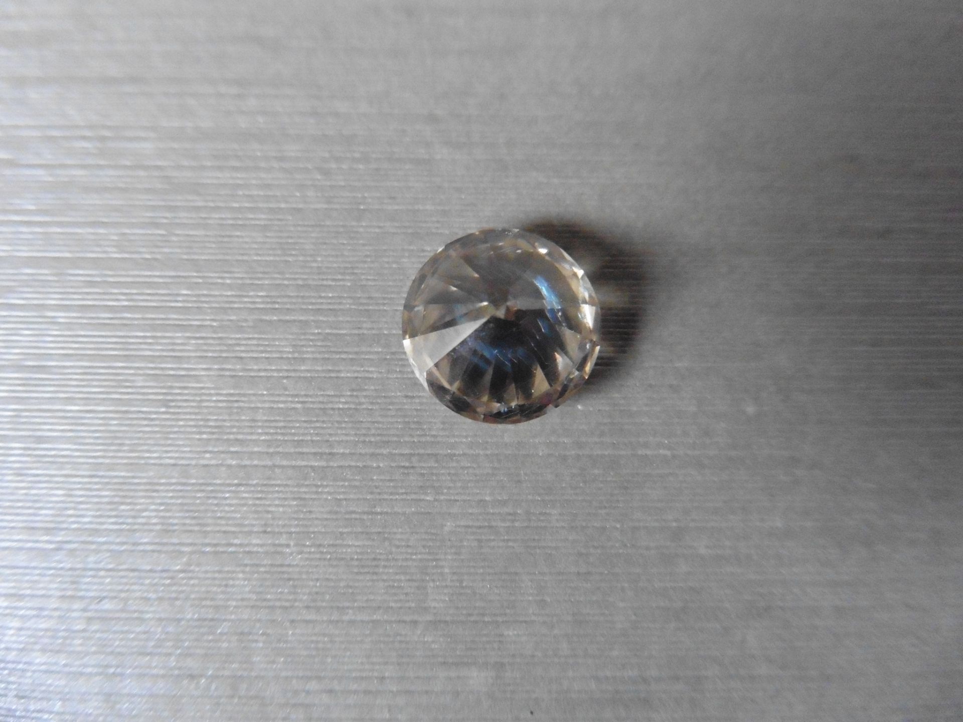 4.41ct single brilliant cut diamond. Measures 10.44 x 6.57 mm. - Image 4 of 5