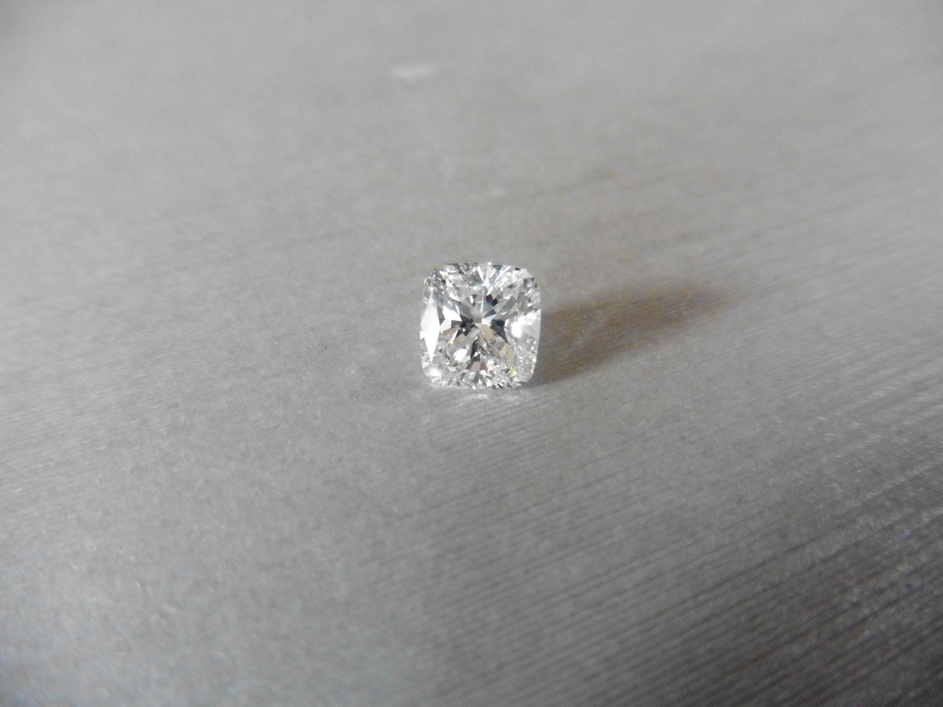 1.21ct cushion cut diamond, F colour and VS2 clarity. Measures 6.54 x 6.06 x 4.15mm. GIA certificate