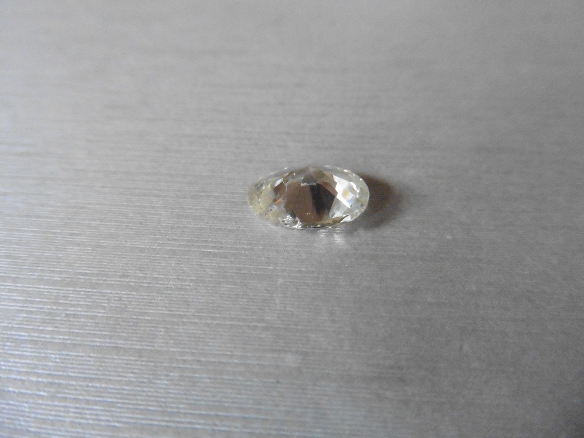 4.41ct single oval cut diamond. Measures 12.66 x 9.38 x 5.40mm. I colour, si3 clarity - Image 3 of 5