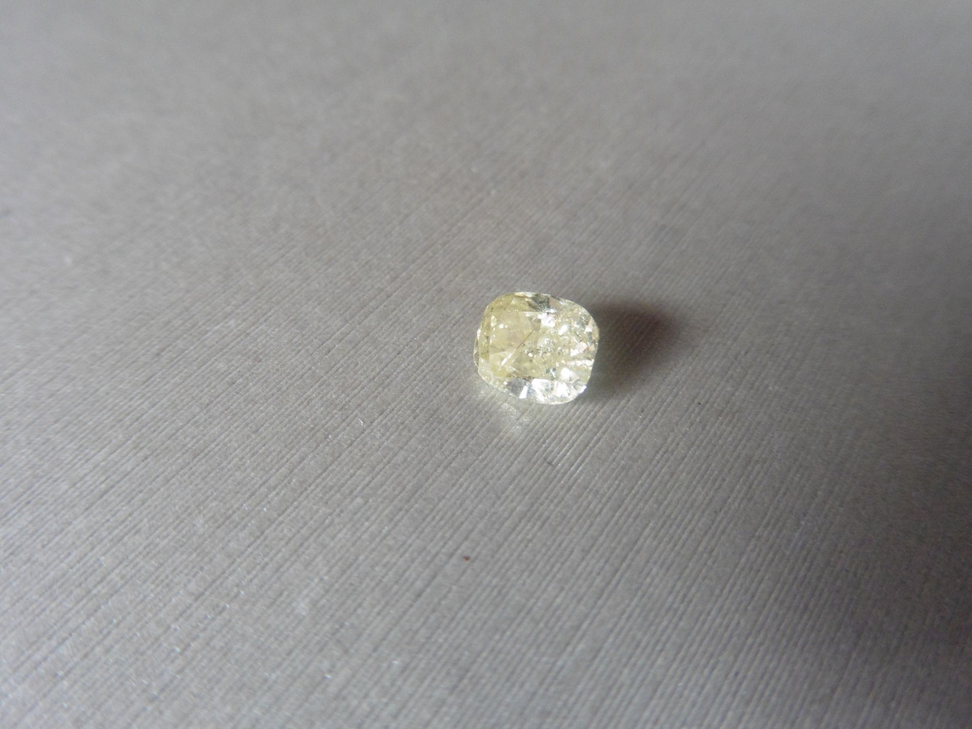 1.57ct loose cushion cut diamond. Fancy yellow colour and I1 clarity. 7.13 x 6.22 x 4.09mm. - Image 4 of 4