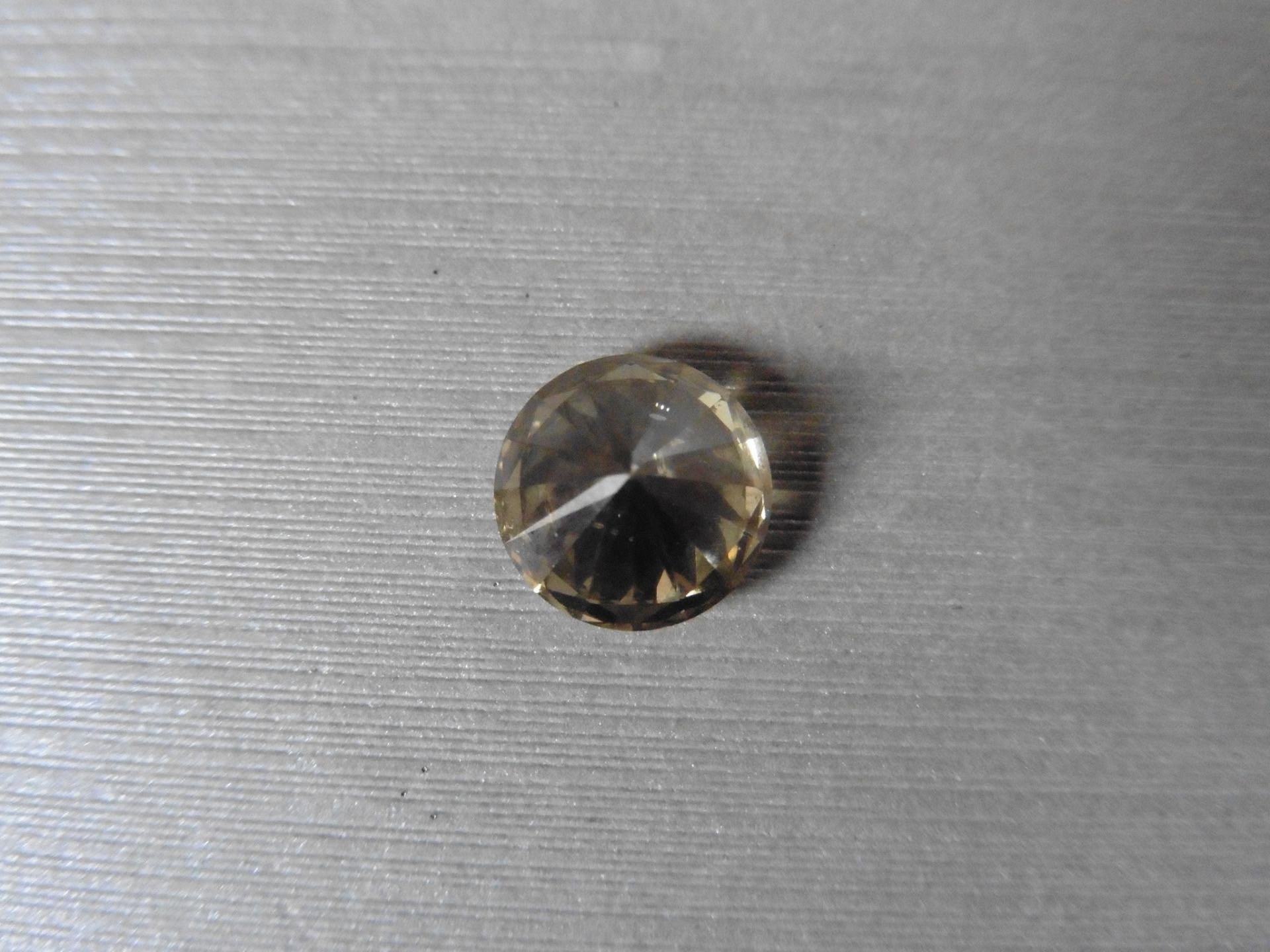 3.04ct single brilliant cut diamond. Measures 7.28 x 5.62mm. Colour – brown. - Image 4 of 5