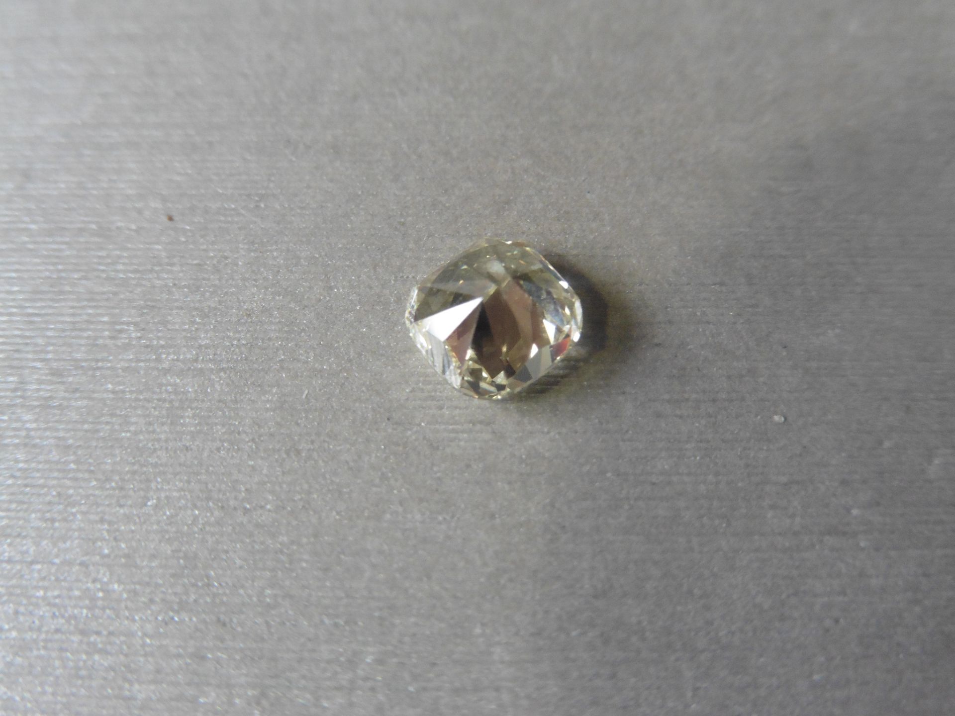 1.33ct loose cushion cut diamond. Fancy yellow colour ( y-z) VVS2 clarity. 6.59 x 6.32 x 3.79mm. - Image 3 of 4