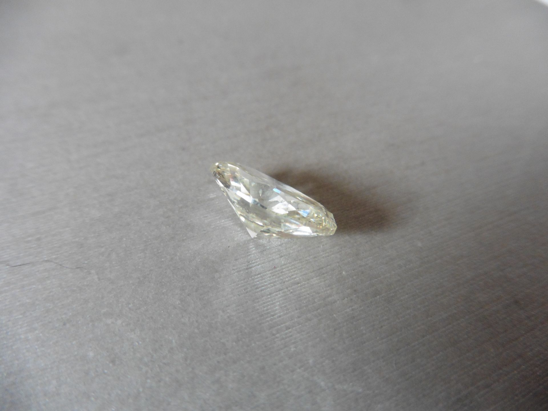 6.05ct single oval cut diamond. Measures 14.44 x 10.33 x 6.17mm. K-L colour, Si clarity. - Image 2 of 5