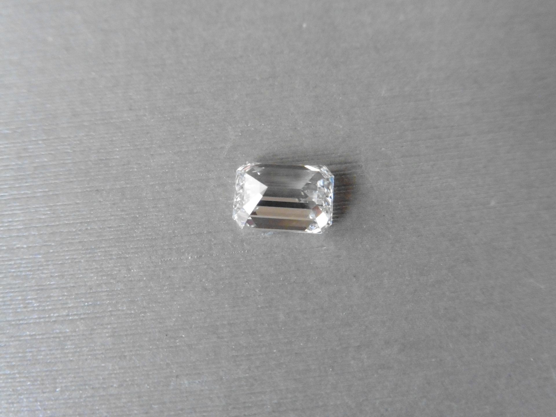 2.00ct single emerald cut diamond. Measures 8.46 x 6.01 x 3.94mm. E colour VS1 clarity.