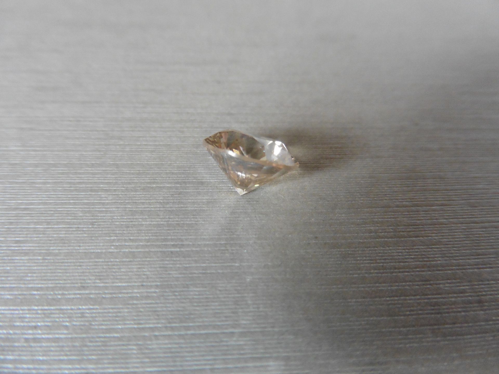 4.41ct single brilliant cut diamond. Measures 10.44 x 6.57 mm. - Image 2 of 5