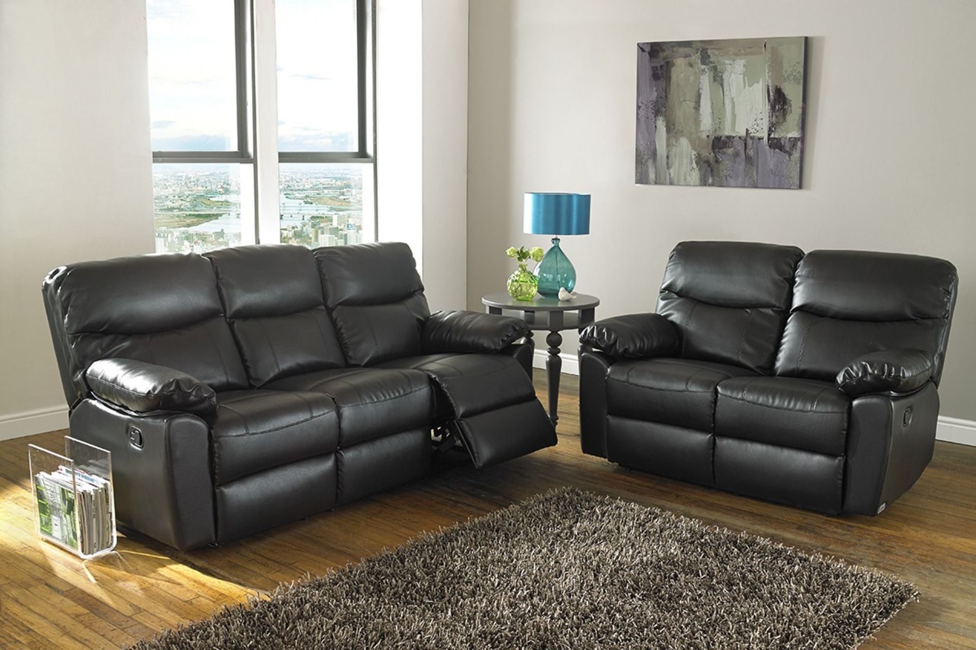 Leanne 3 seater leather reclining sofa in gun metal grey