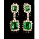 Pair of Emerald (8ct) & Diamond (3ct) earrings set in white gold.