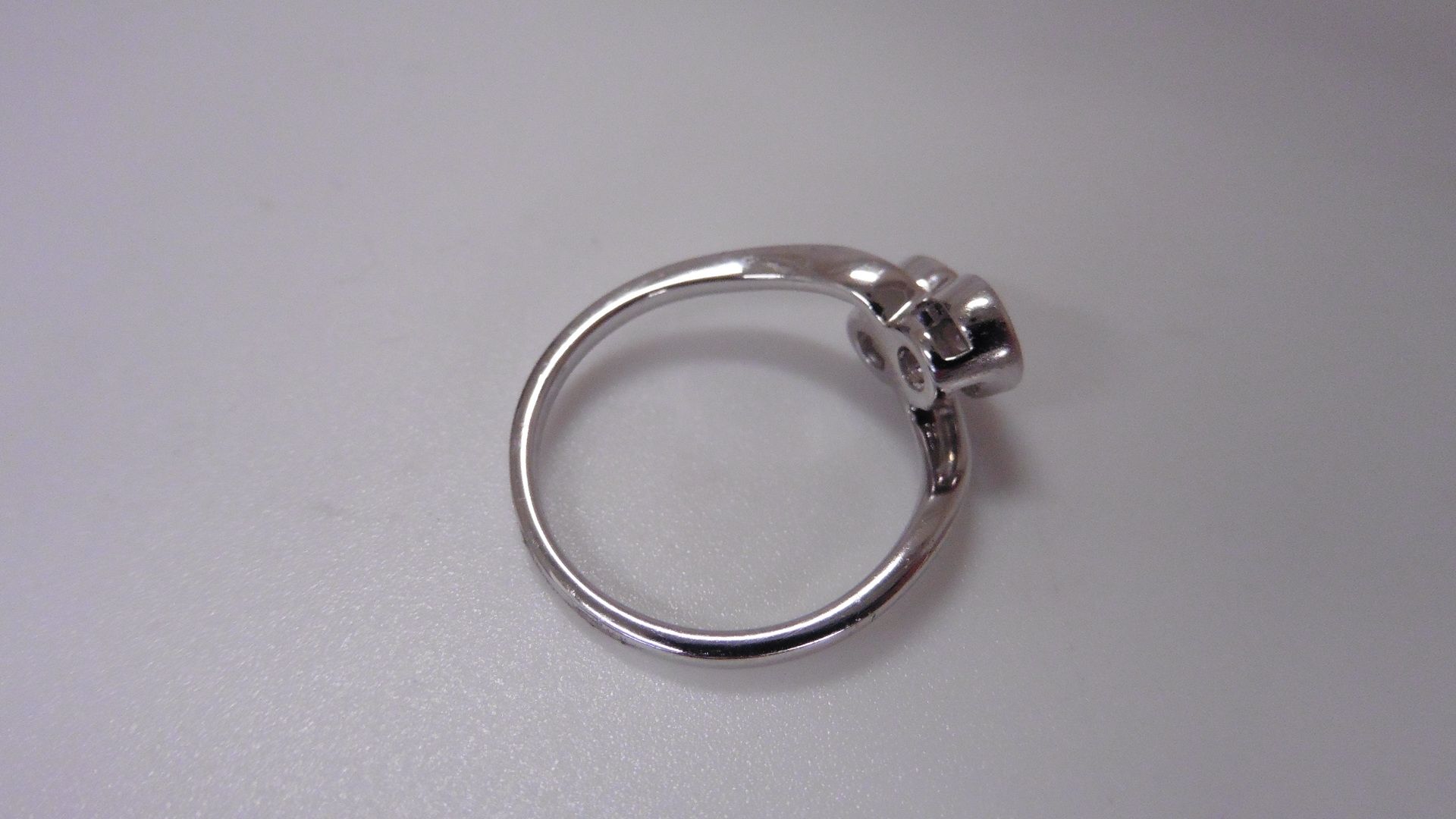 1ct two stone twist ring set in platinum. Brilliant cut diamonds, I/J colour, si2 clarity weighing - Image 3 of 3