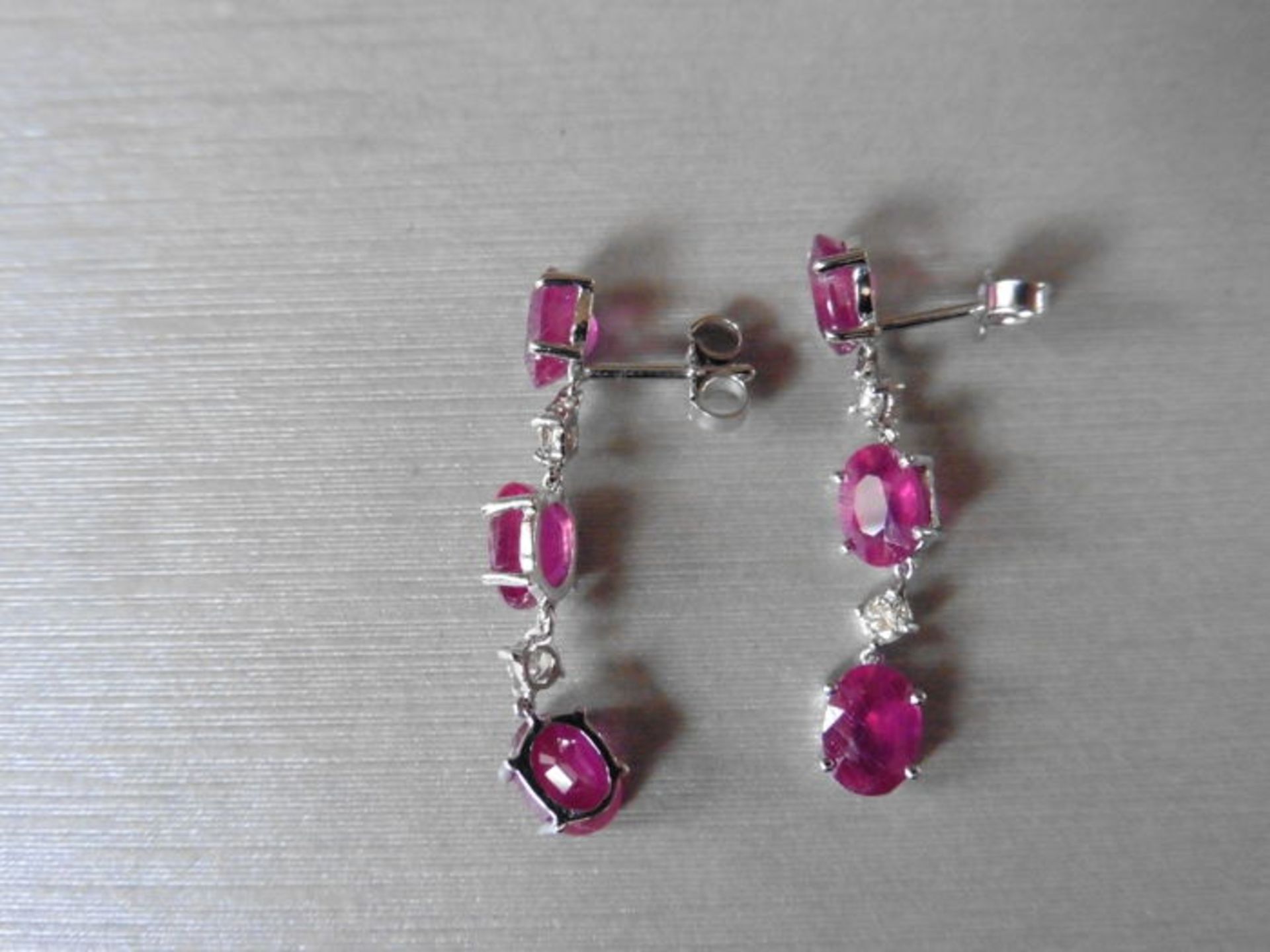 4.80ct ruby and diamond drop earrings set in platinum. Each set with 3 oval cut rubies ( glass - Image 2 of 3