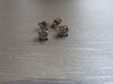 0.30ct diamond solitaire stud earrings set in platinum. I/J colour, si2 clarity.4 claw setting