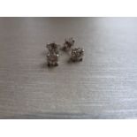 0.30ct diamond solitaire stud earrings set in platinum. I/J colour, si2 clarity.4 claw setting