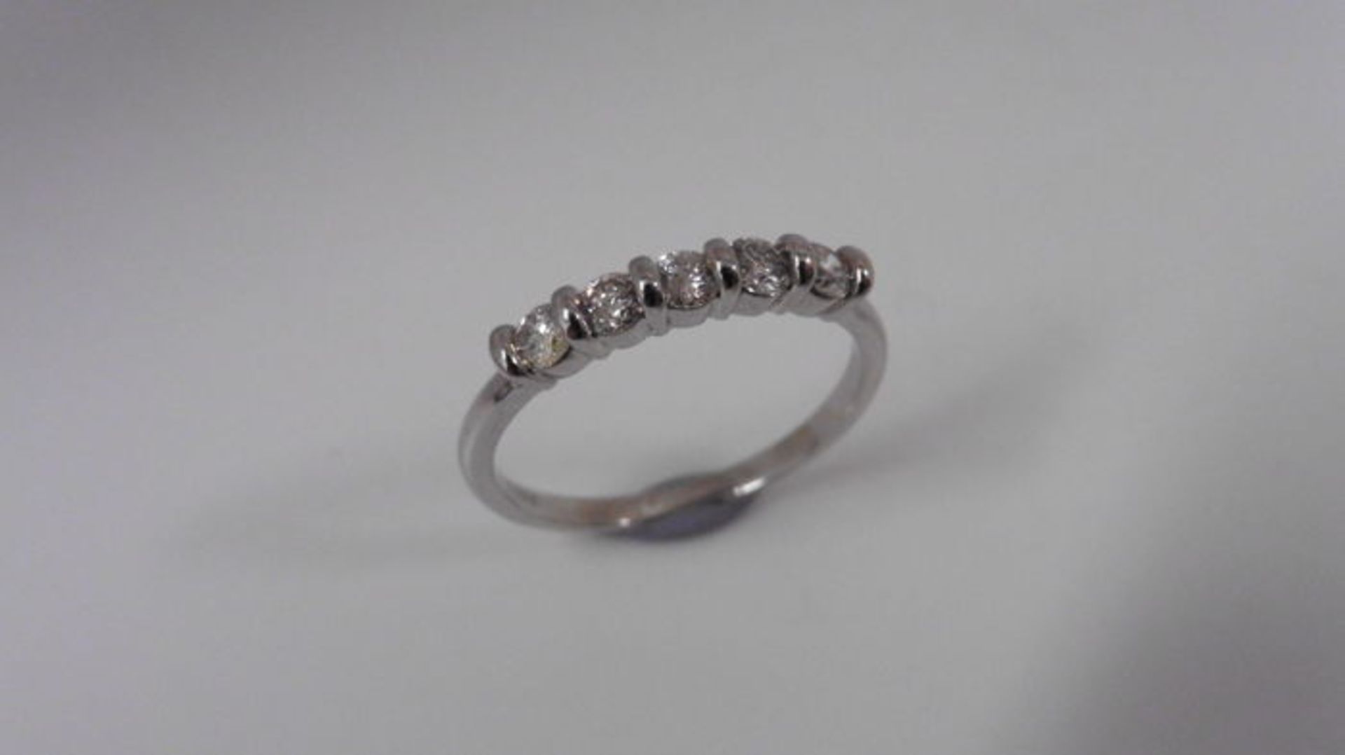 0.50ct diamond five stone ring. Brilliant cut diamonds, I colour and si3 clarity. Claw setting in