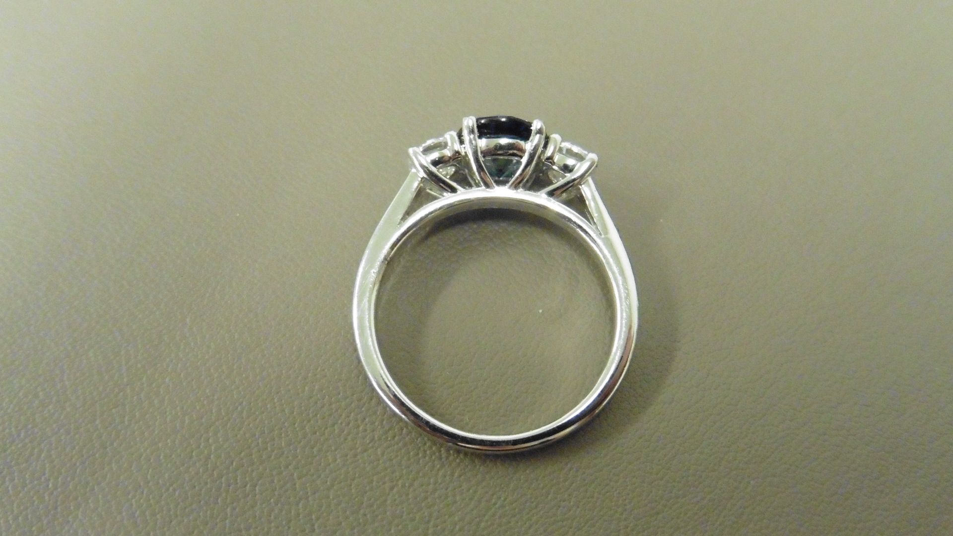 Sapphire and diamond trilogy ring. 5mm round cut sapphire ( treated ) with a brilliant cut diamond - Image 2 of 3