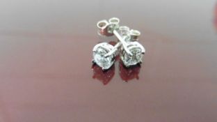 0.80ct Solitaire diamond stud earrings set with brilliant cut diamonds. I/J colour, si2 clarity