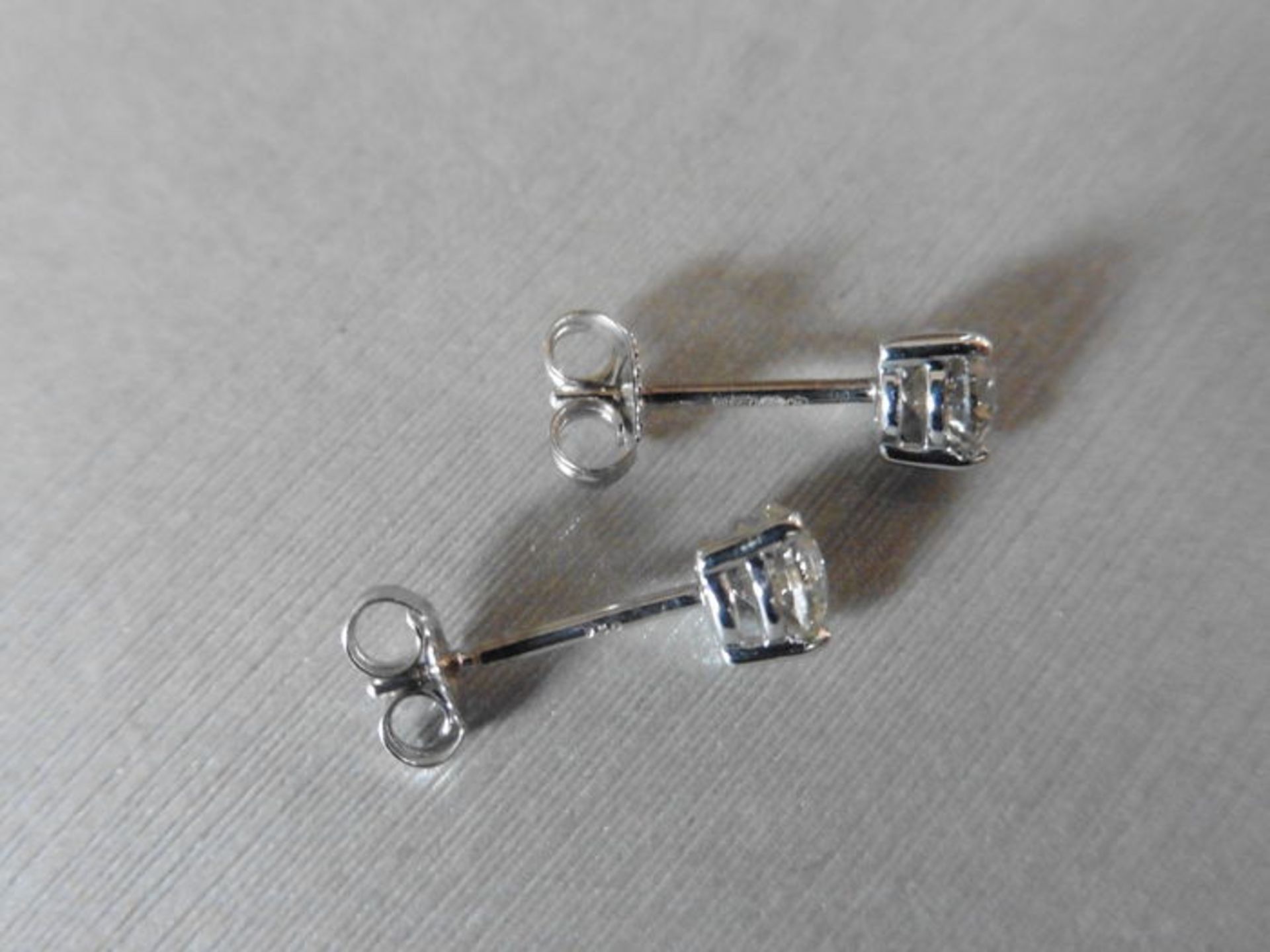 1.40ct diamond solitaire stud earrings, 0.70ct each stone, I colour and I1-2 clarity. 3 claw setting - Image 2 of 2