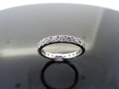 1.50ct full diamond band ring. Brilliant cut diamonds, I colour, si3 clarity. Claw setting. Size