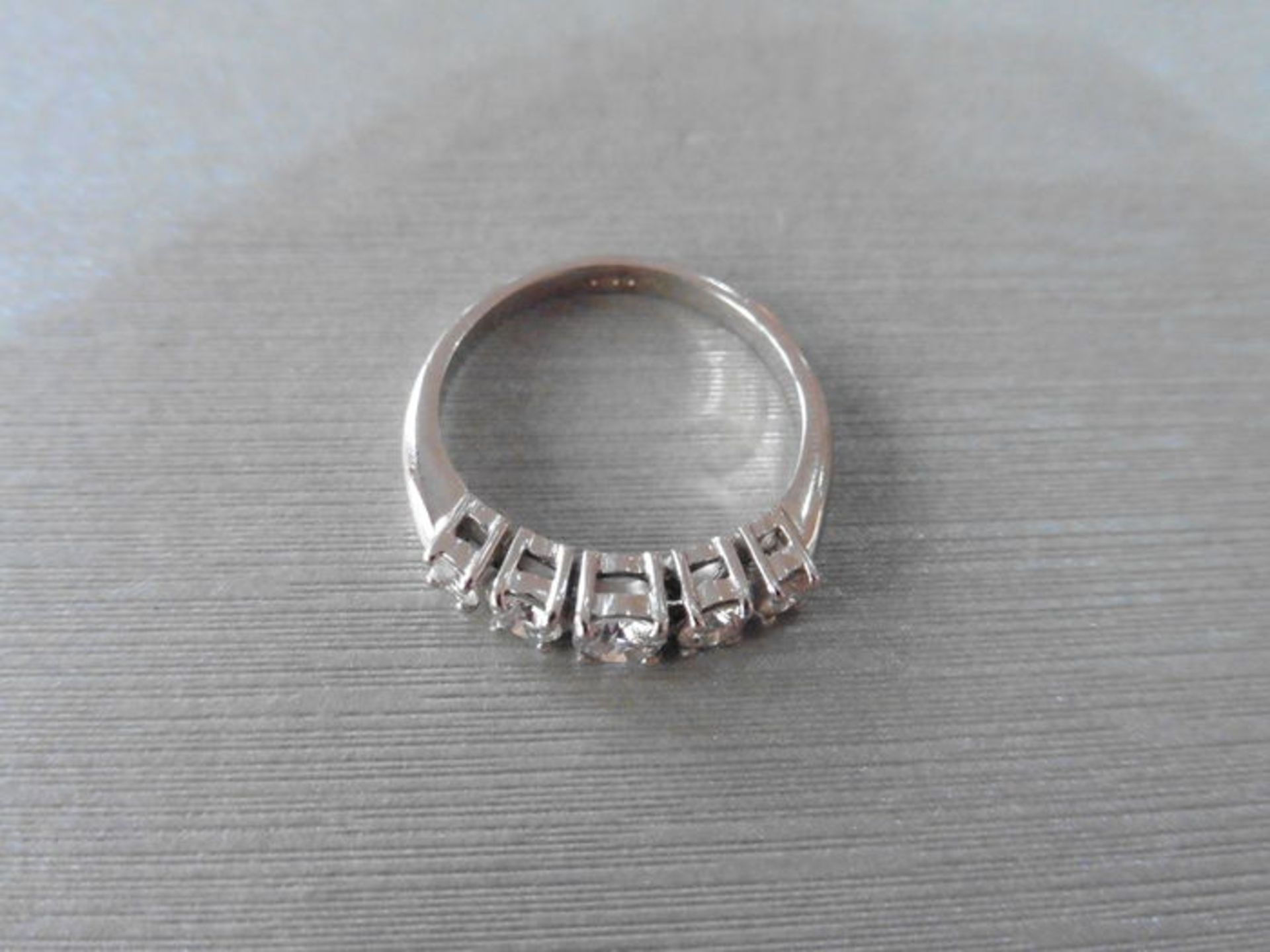 0.75ct diamond five stone ring set in platinum. 5 graduated brilliant cut diamonds, H/I colour, - Image 2 of 3