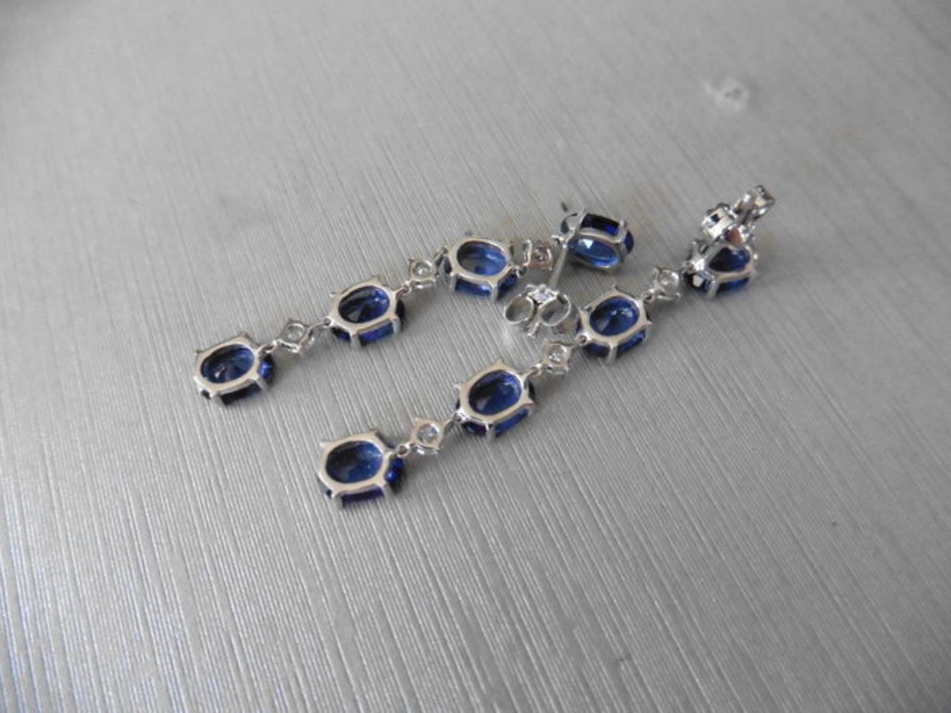 Sapphire and diamond drop style earrings set in platinum. Each set with 4 oval cut ( treated) - Image 2 of 3