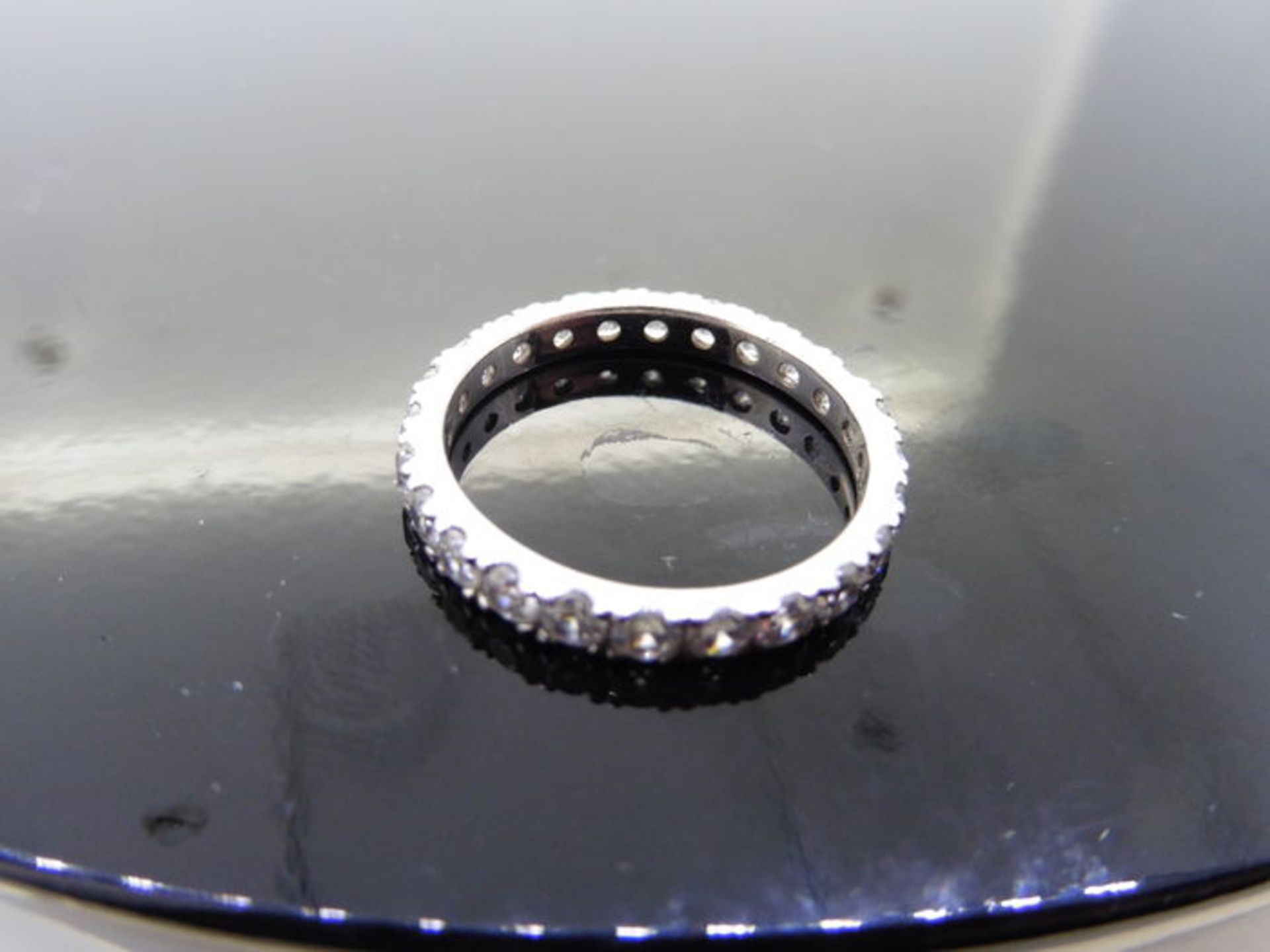 1.50ct full diamond band ring. Brilliant cut diamonds, I colour, si3 clarity. Claw setting. Size - Image 2 of 3