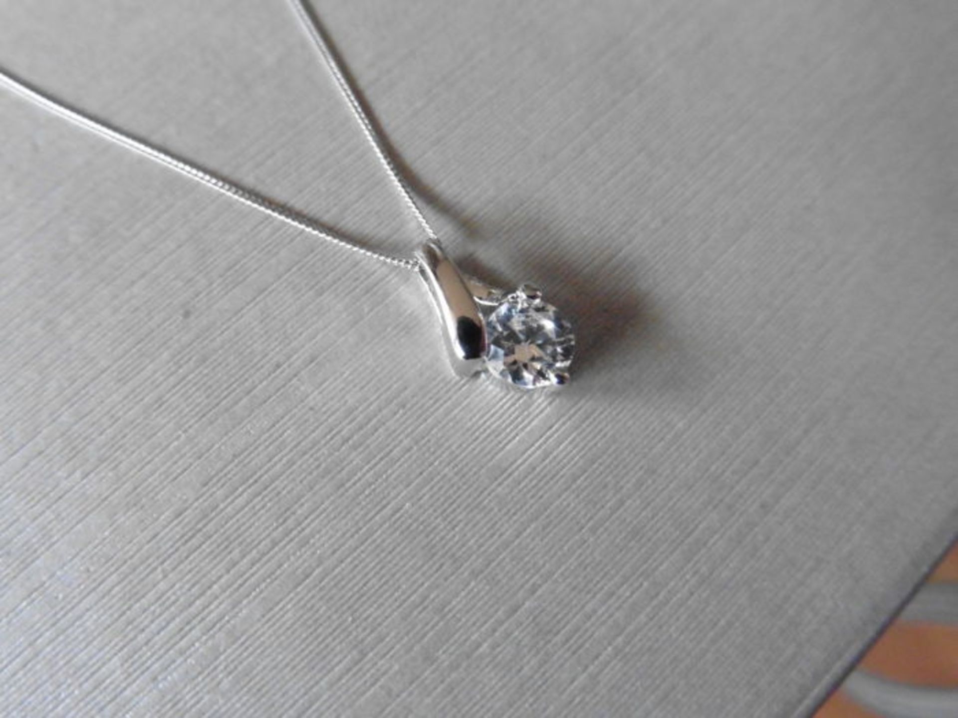 1.01ct diamond pendant with an brilliant cut diamond. H colour and I1-2 clarity. Set in platinum 3