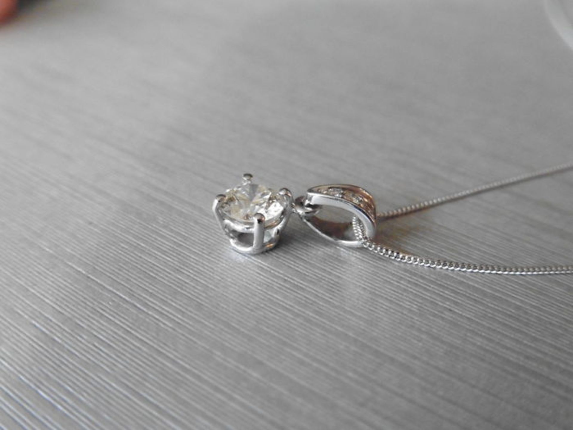 0.40ct diamond set pendant. Brilliant cut diamond, I colour and si3 clarity. The bale is set with - Image 2 of 3