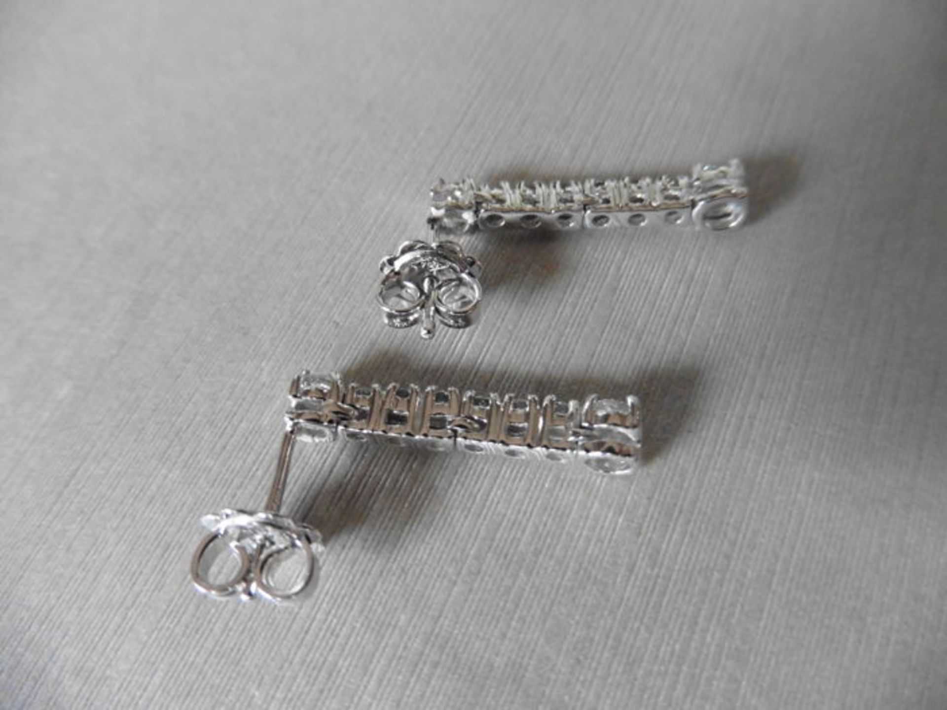 0.60ct diamond drop earrings in platinum. 8 brilliant cut diamonds, I colour, si3 clarity. - Image 2 of 3