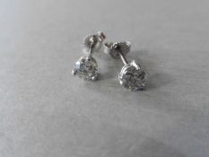 1.40ct diamond solitaire stud earrings, 0.70ct each stone, I colour and I1-2 clarity. 3 claw setting