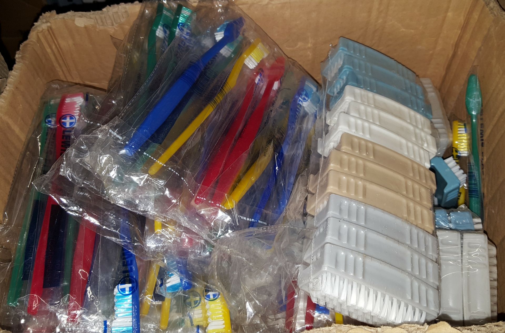 Box of Plastic Nail Brushes and Tooth Brushes