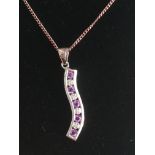 Sterling Silver(925) diamond and purple topaz wavey style pendant and chain