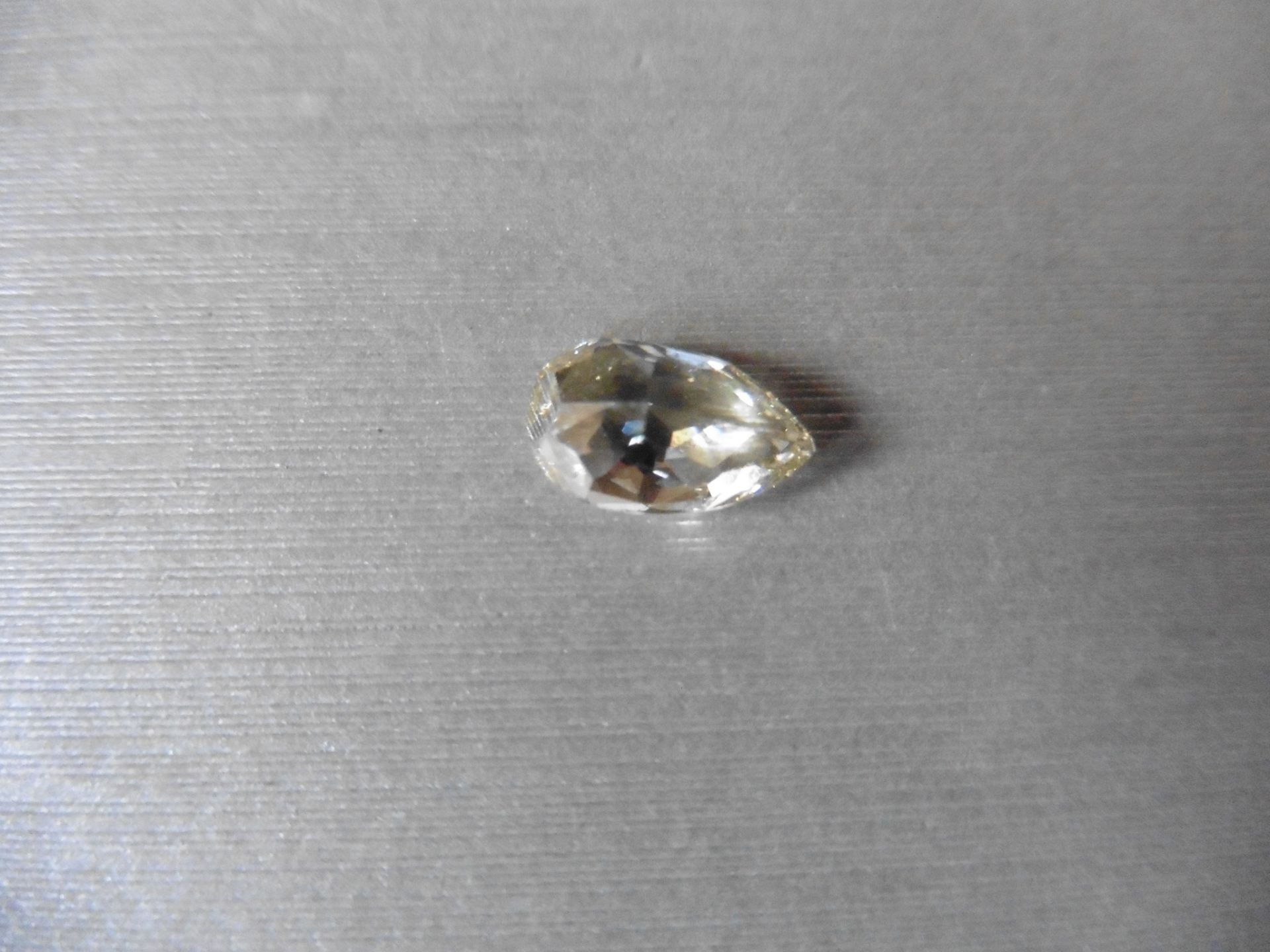 2.14ct single pear shaped diamond, fancy yellow, VVS1 clarity. Measures 11.05 x 6.70 x 4.08mm. HRD - Image 4 of 6