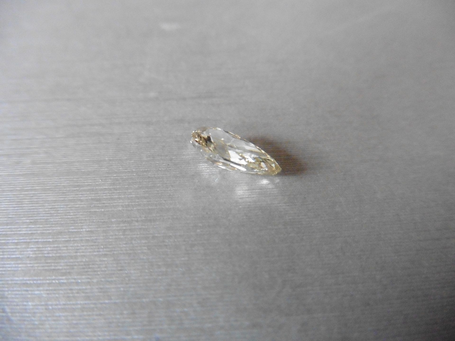 2.14ct single pear shaped diamond, fancy yellow, VVS1 clarity. Measures 11.05 x 6.70 x 4.08mm. HRD - Image 2 of 6