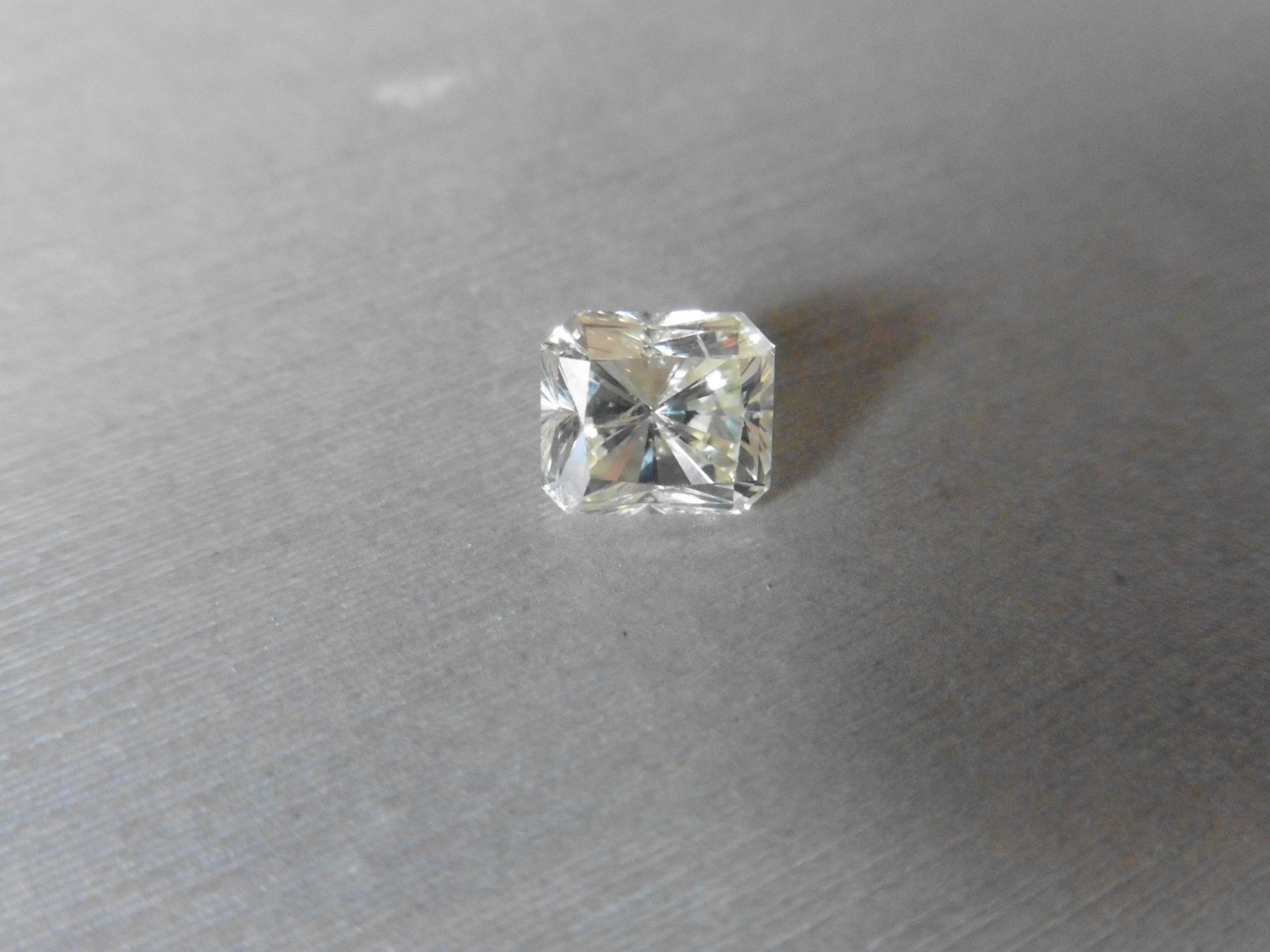 2.65ct single radiant cut diamond. Measures 7.82 x 6.94 x 5.95mm. K-L colour and Si clarity. No