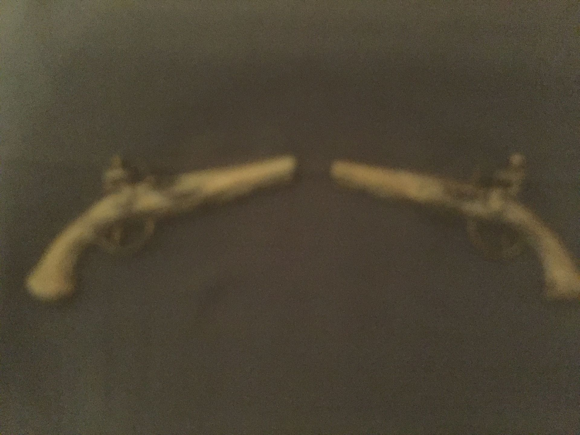 No Reserve VINTAGE PAIR OF BRASS WALL HANGING FLINTLOCK GUNS - USED