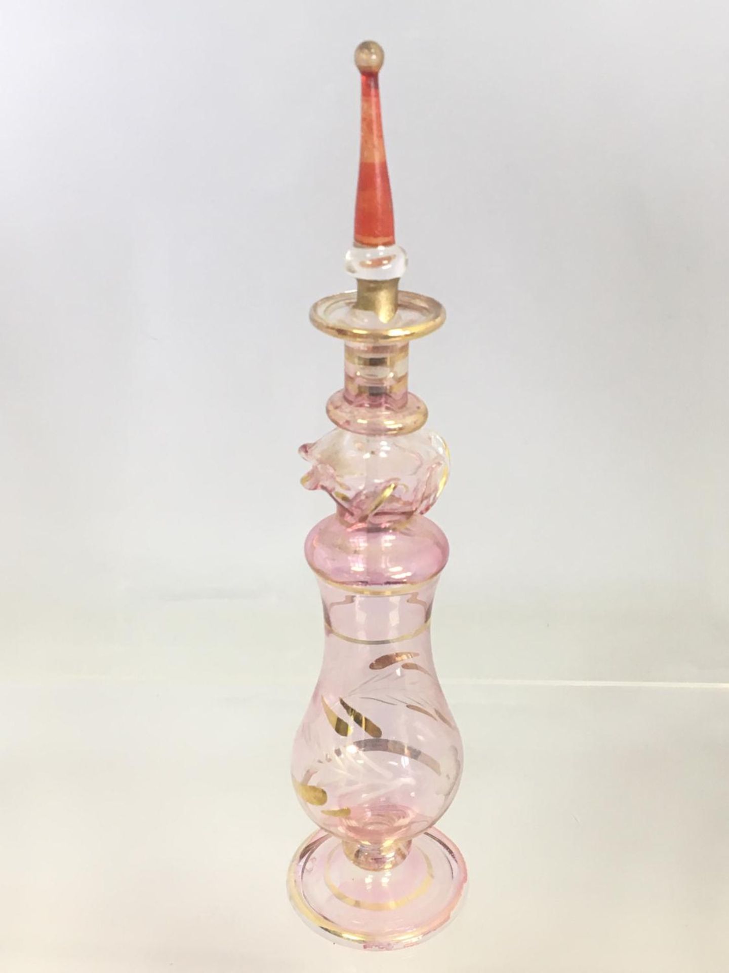 Pre-Owned - A glass perfume bottle - 6 inches to top of lid.