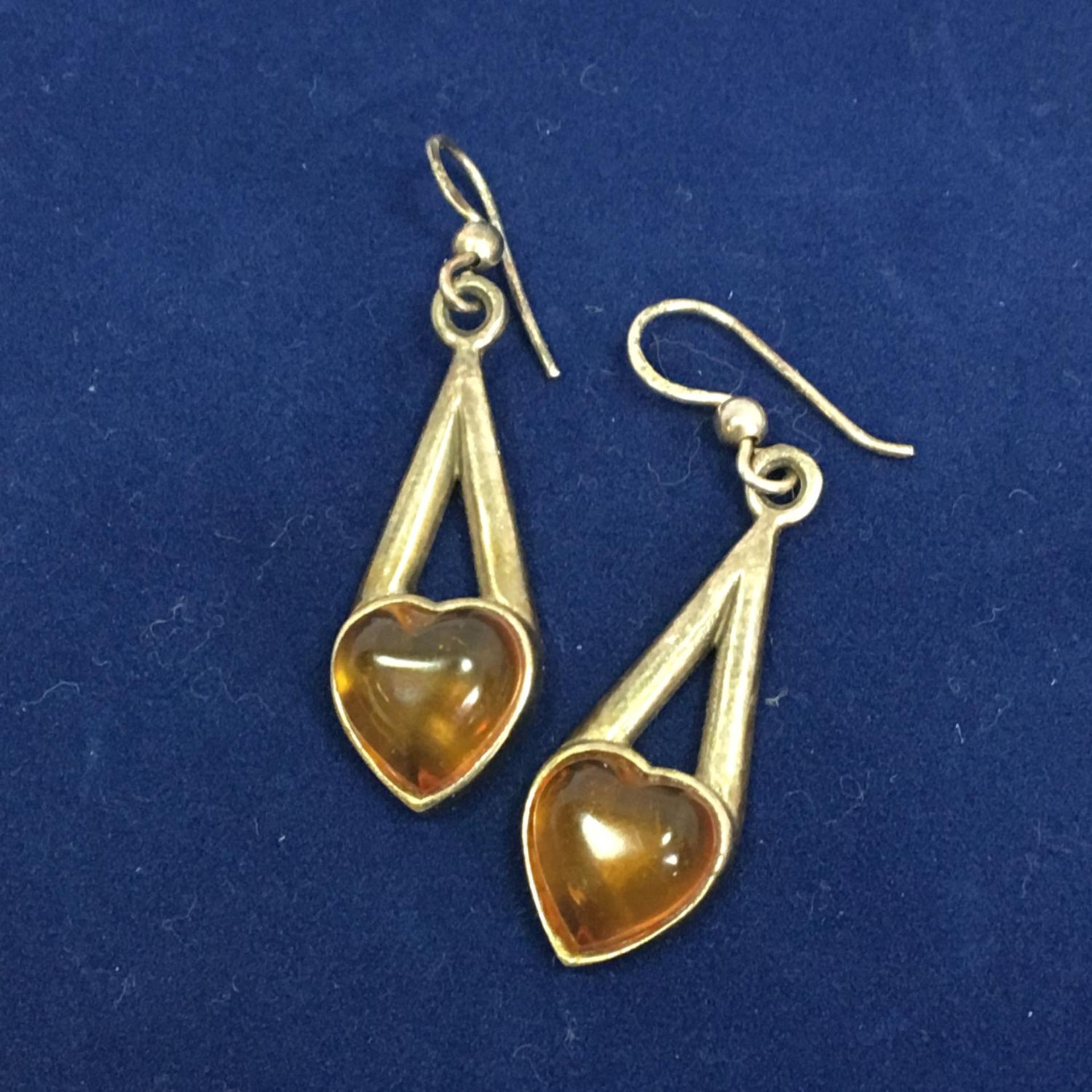 Pre-Owned - Pair of 40mm drop 925 silver earrings, each set with an amber heart