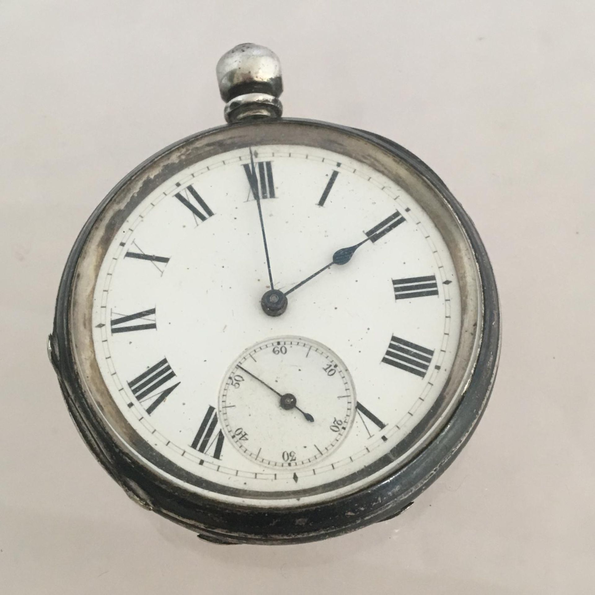 An antique JOHN BENNETT pocket watch for repair, the case marked Fine Silver