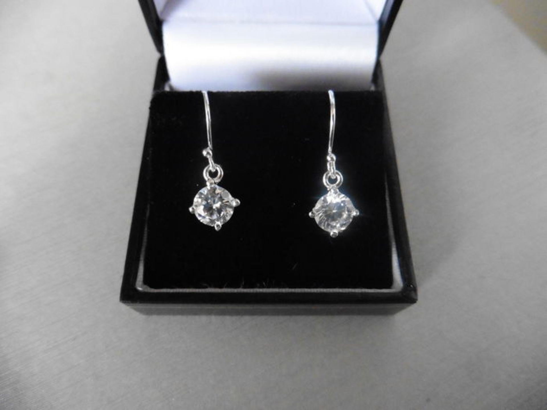 1.40ct diamond drop style solitaire earrings each set with a brilliant cut diamond, H/I colour,