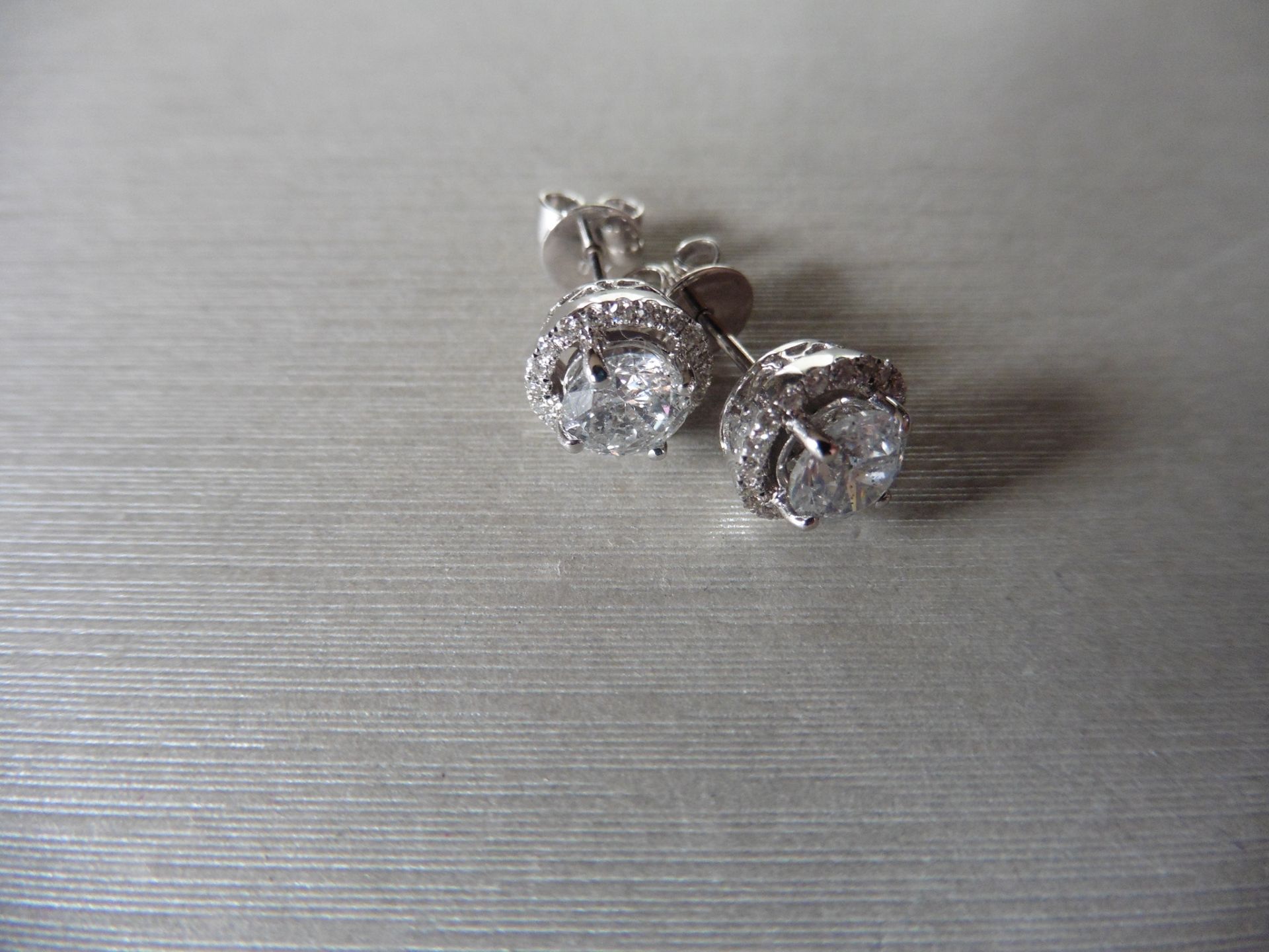 1.50ct Diamond set solitaire style earrings. Each set with 0.75ct brilliant cut diamond, I colour, - Image 2 of 4
