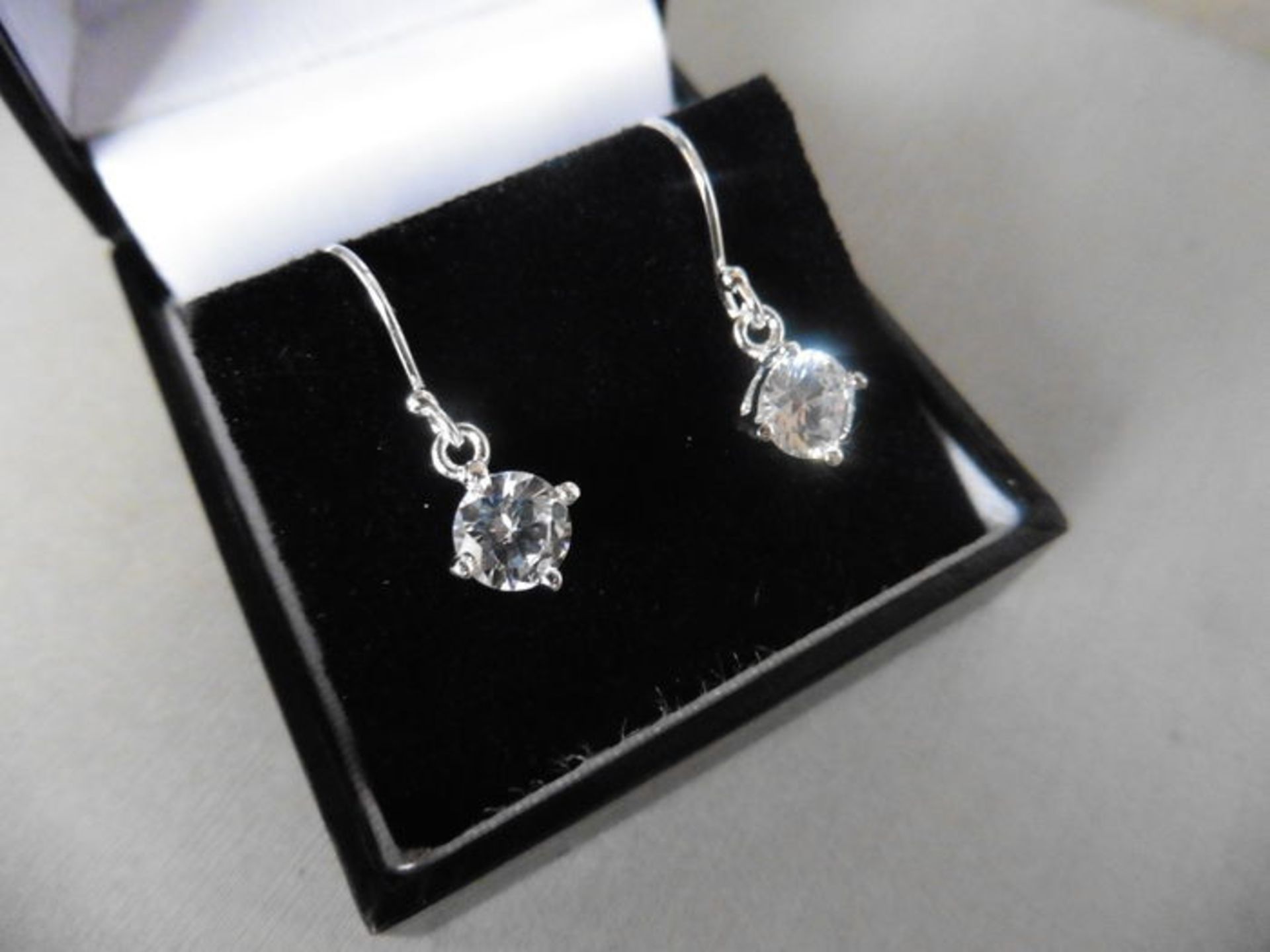 1.00ct diamond drop style solitaire earrings each set with a brilliant cut diamond, I/J colour,