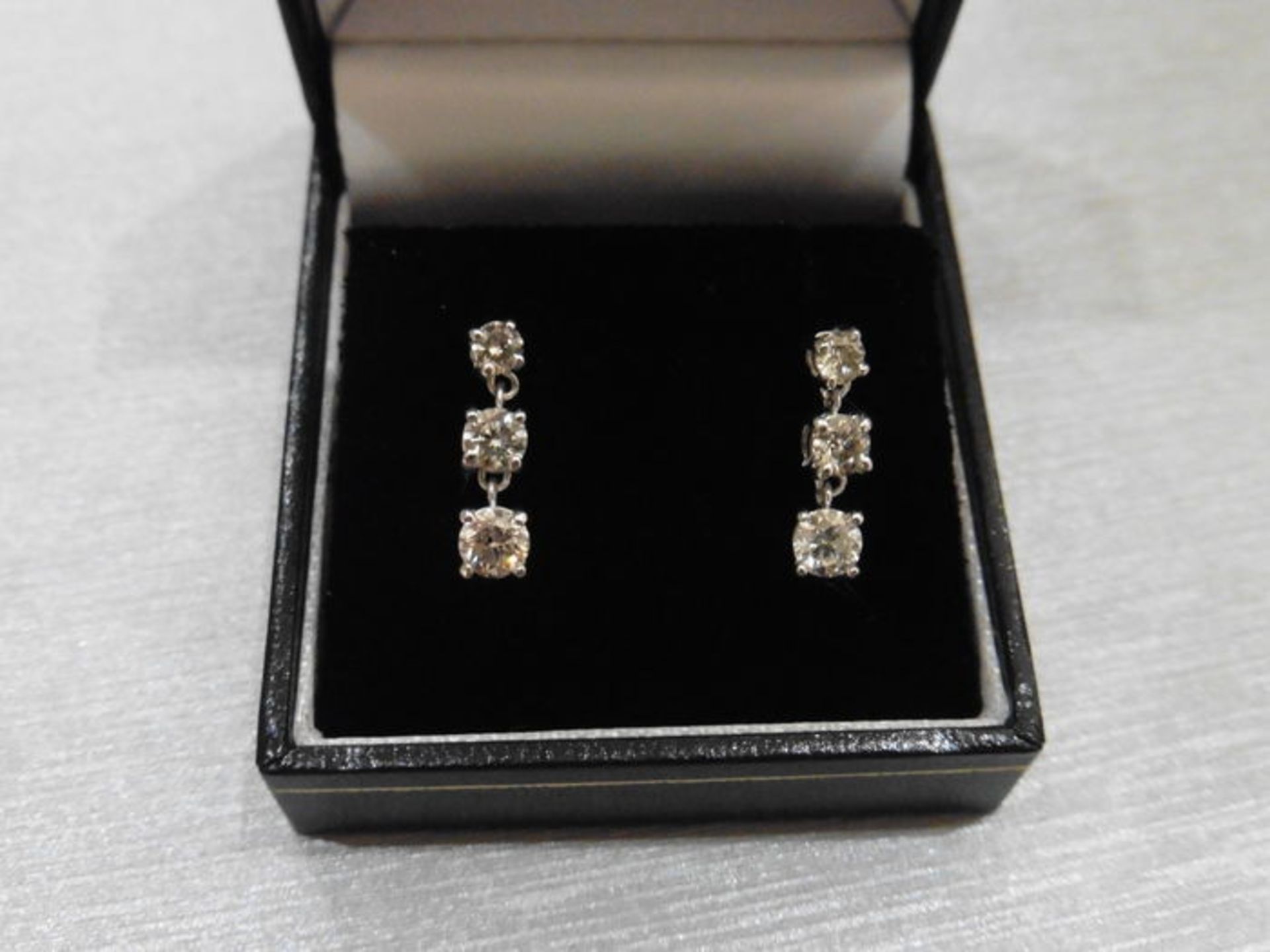 1.20ct diamond trilogy drop earrings. Each is set with 3 graduated brilliant cut diamonds, Si2 - Image 3 of 3