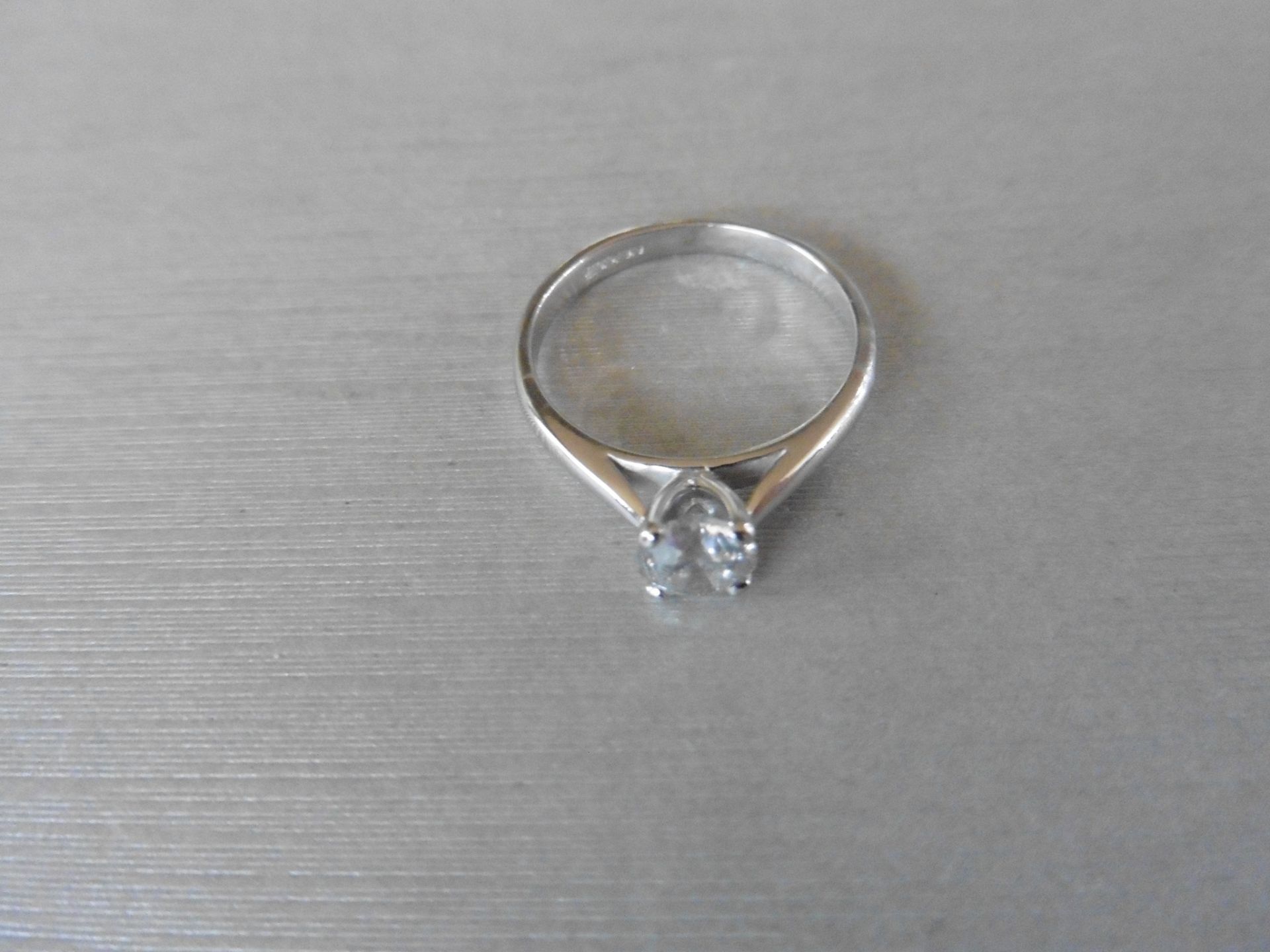 0.75ct Diamond solitaire ring set with a I colour Brilliant cut round diamond, I1 clarity. Set in - Image 2 of 3