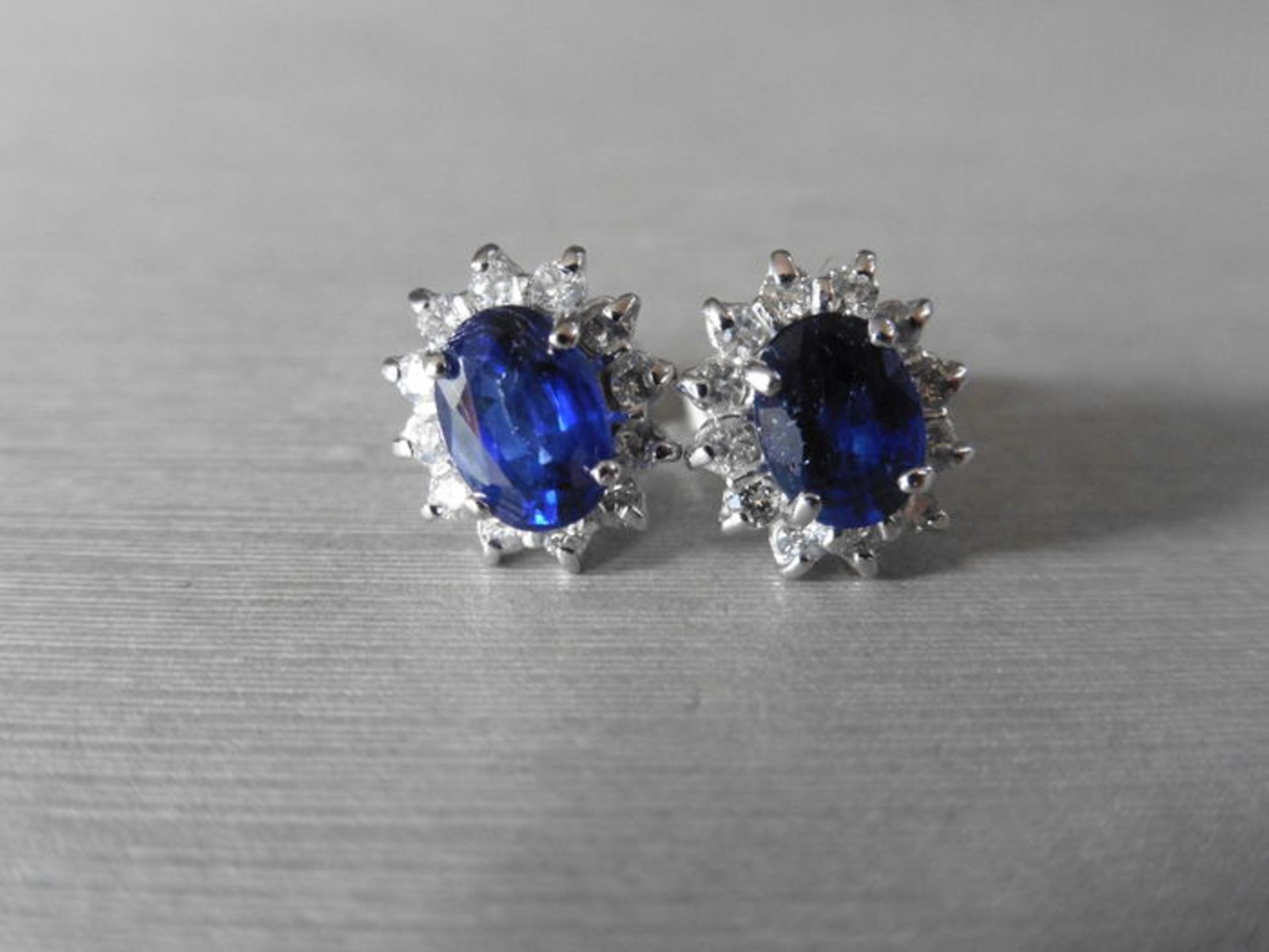 1.60ct Sapphire and Diamond cluster style stud earrings. Each Sapphire measures 7mm x 5mm and is - Image 2 of 4