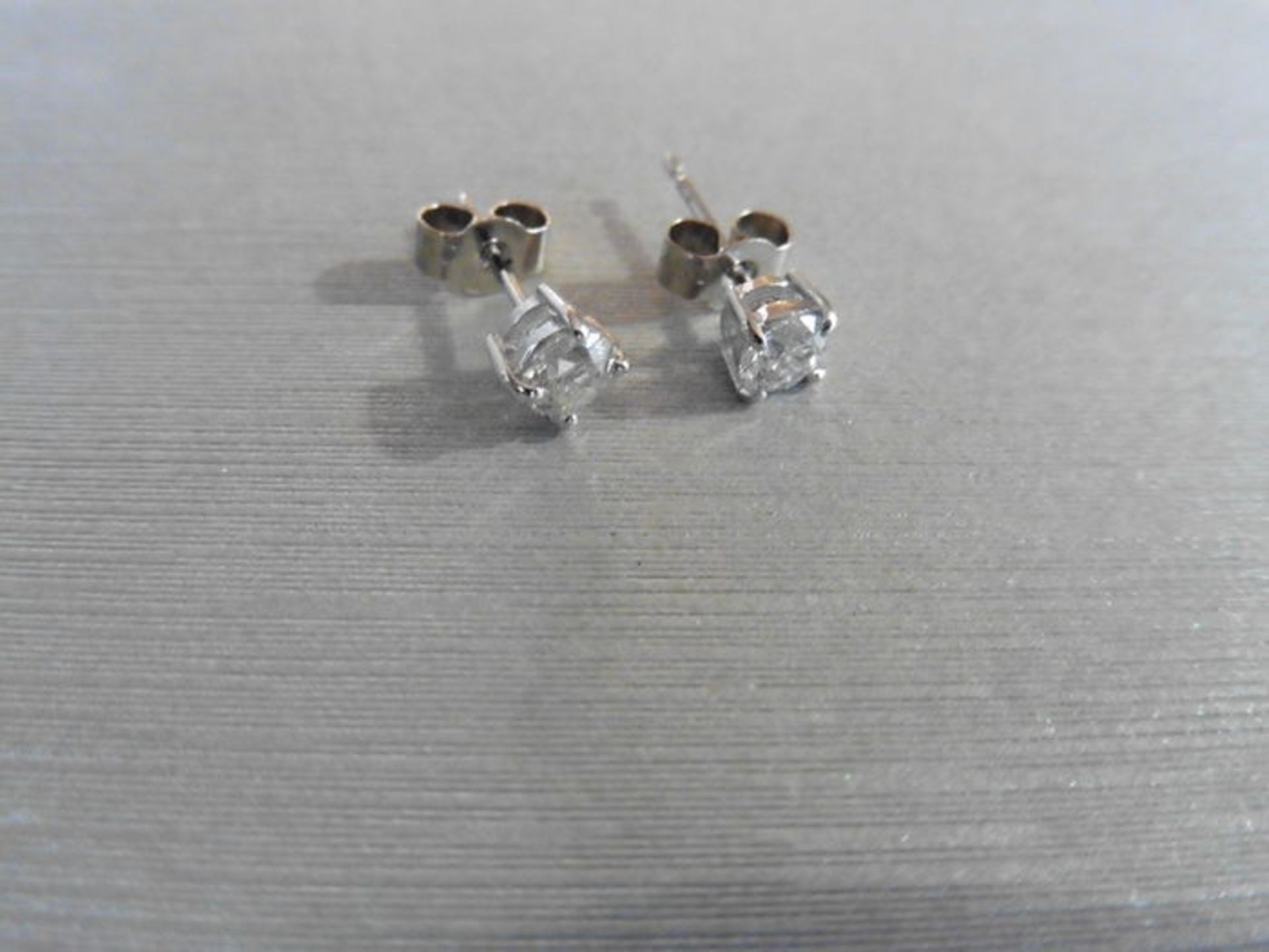 0.50ct Solitaire diamond stud earrings set with brilliant cut diamonds, SI2 clarity and I colour. - Image 2 of 2
