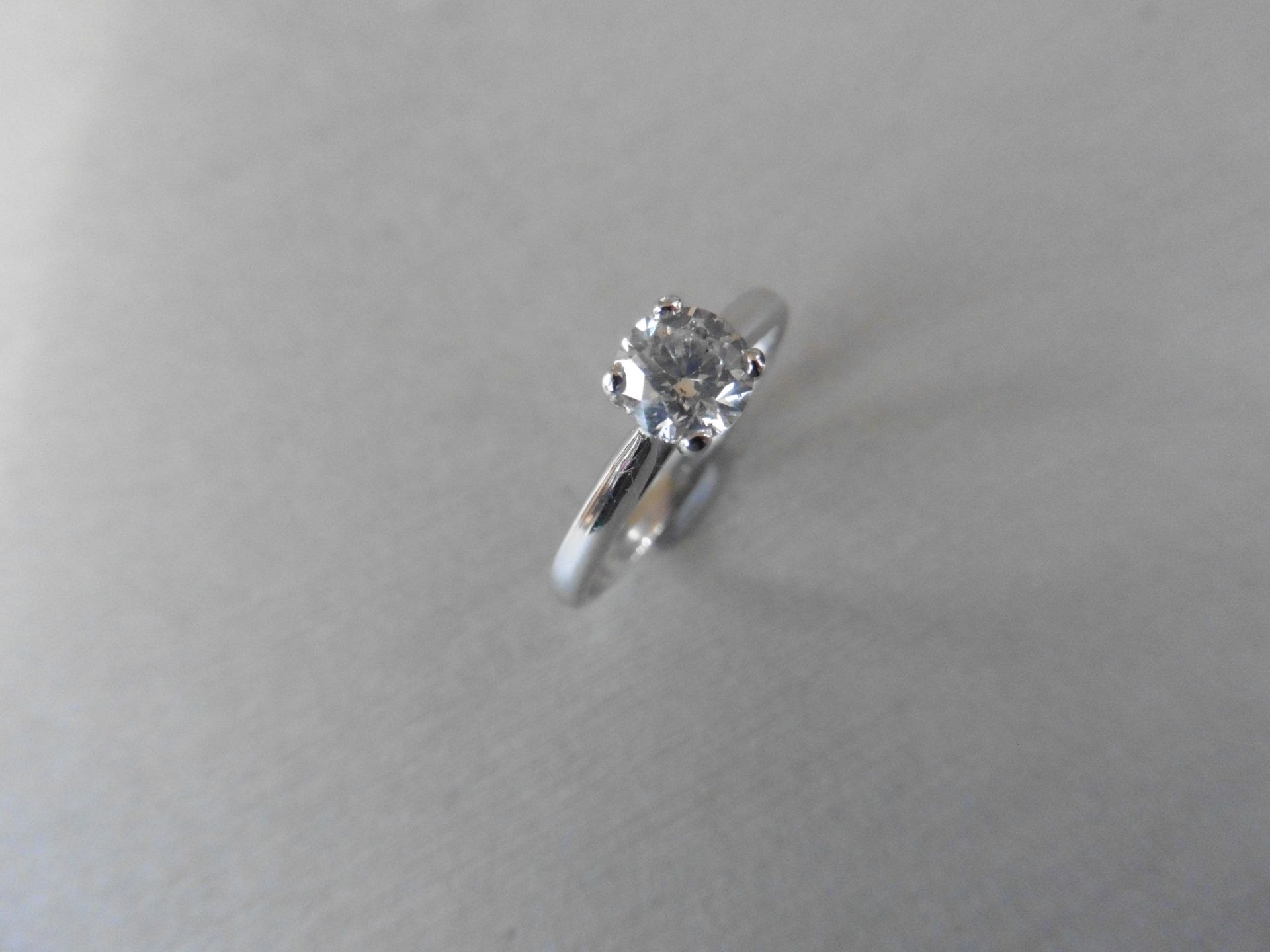 0.75ct Diamond solitaire ring set with a I colour Brilliant cut round diamond, I1 clarity. Set in