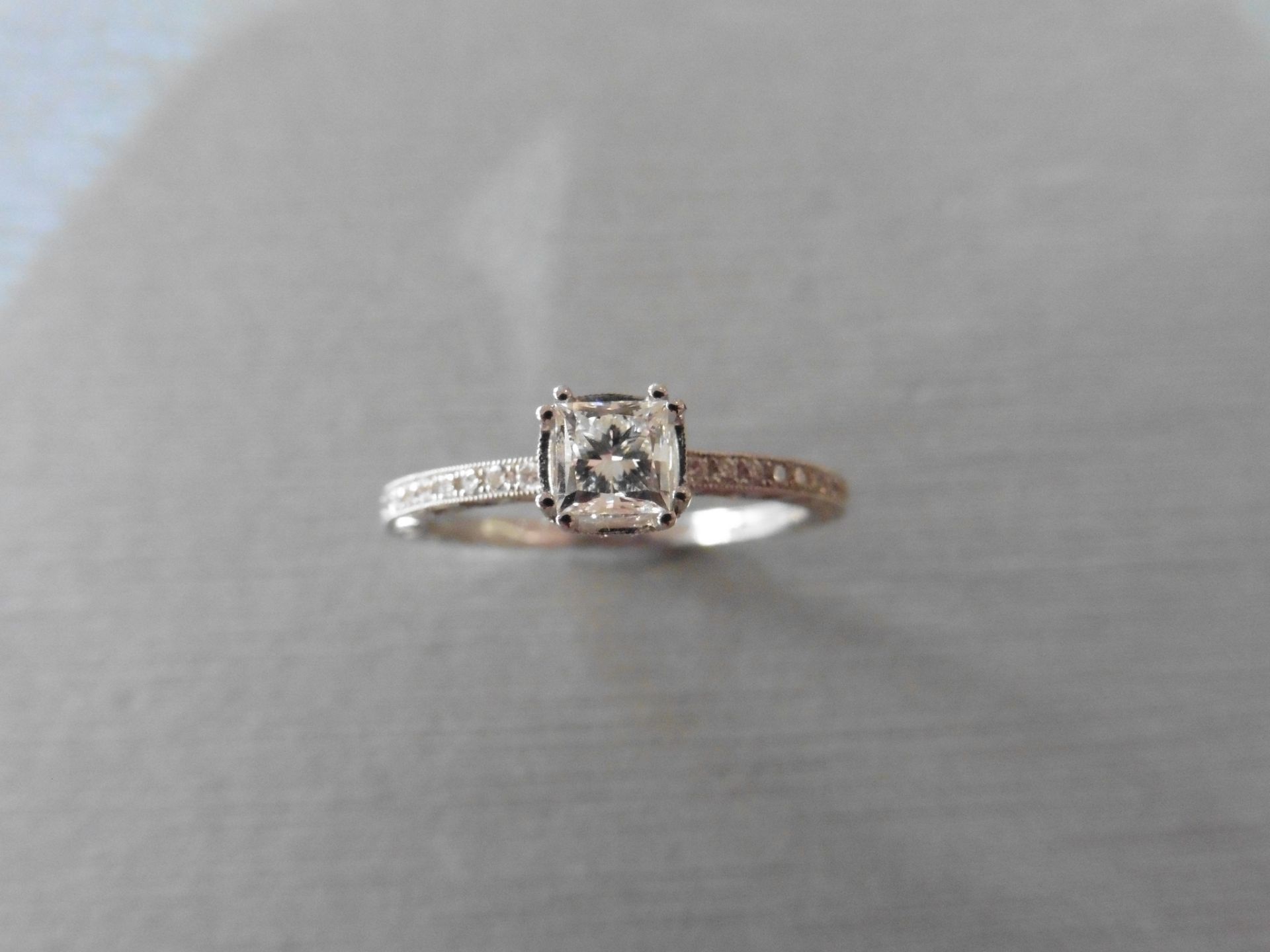 0.47ct Diamond set solitaire with a princess cut diamond, of H colour and SI1 clarity in a double