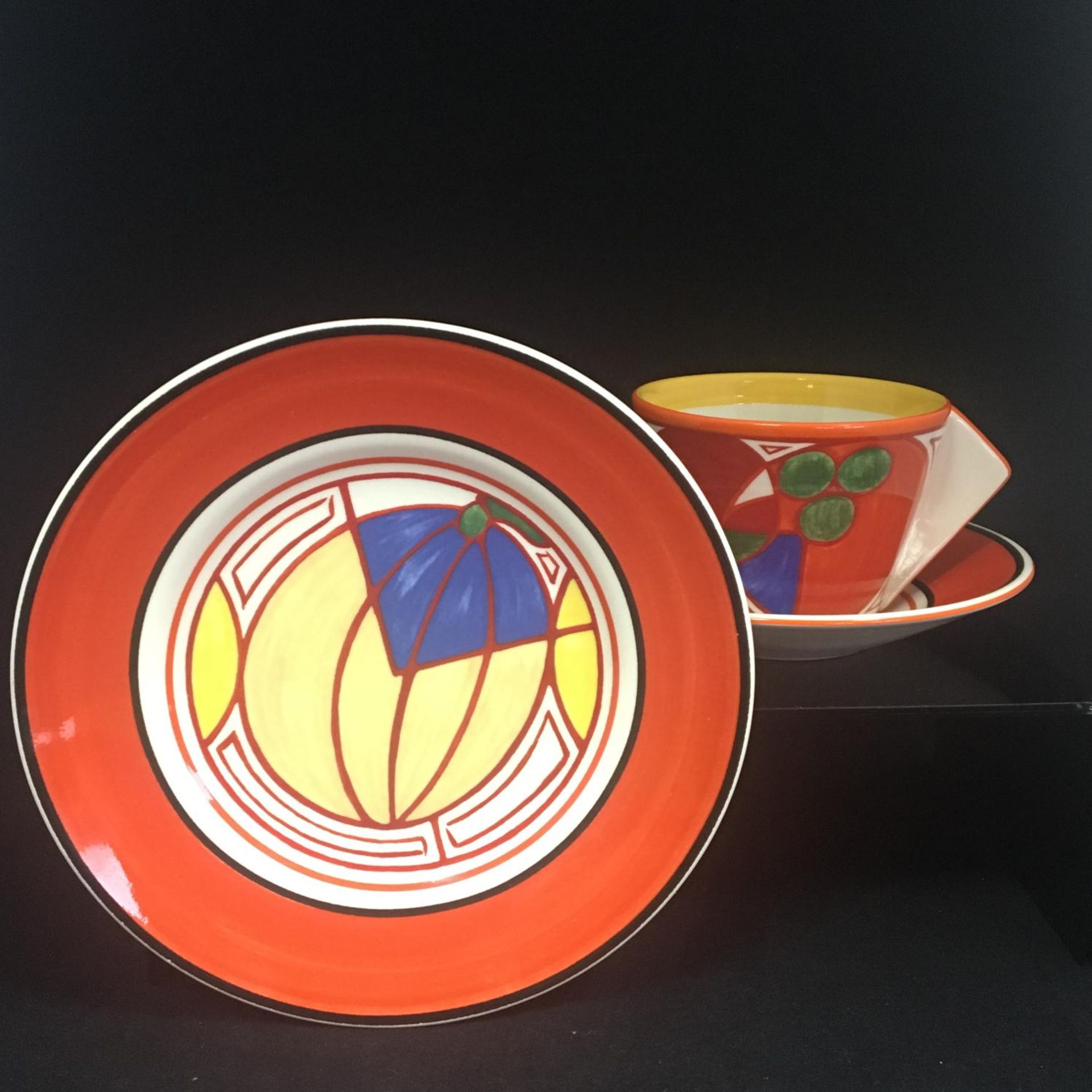 Bizarre by Clarice Cliff for Wedgwod. A trio consisting of teacup, saucer and side plate. - Image 2 of 4