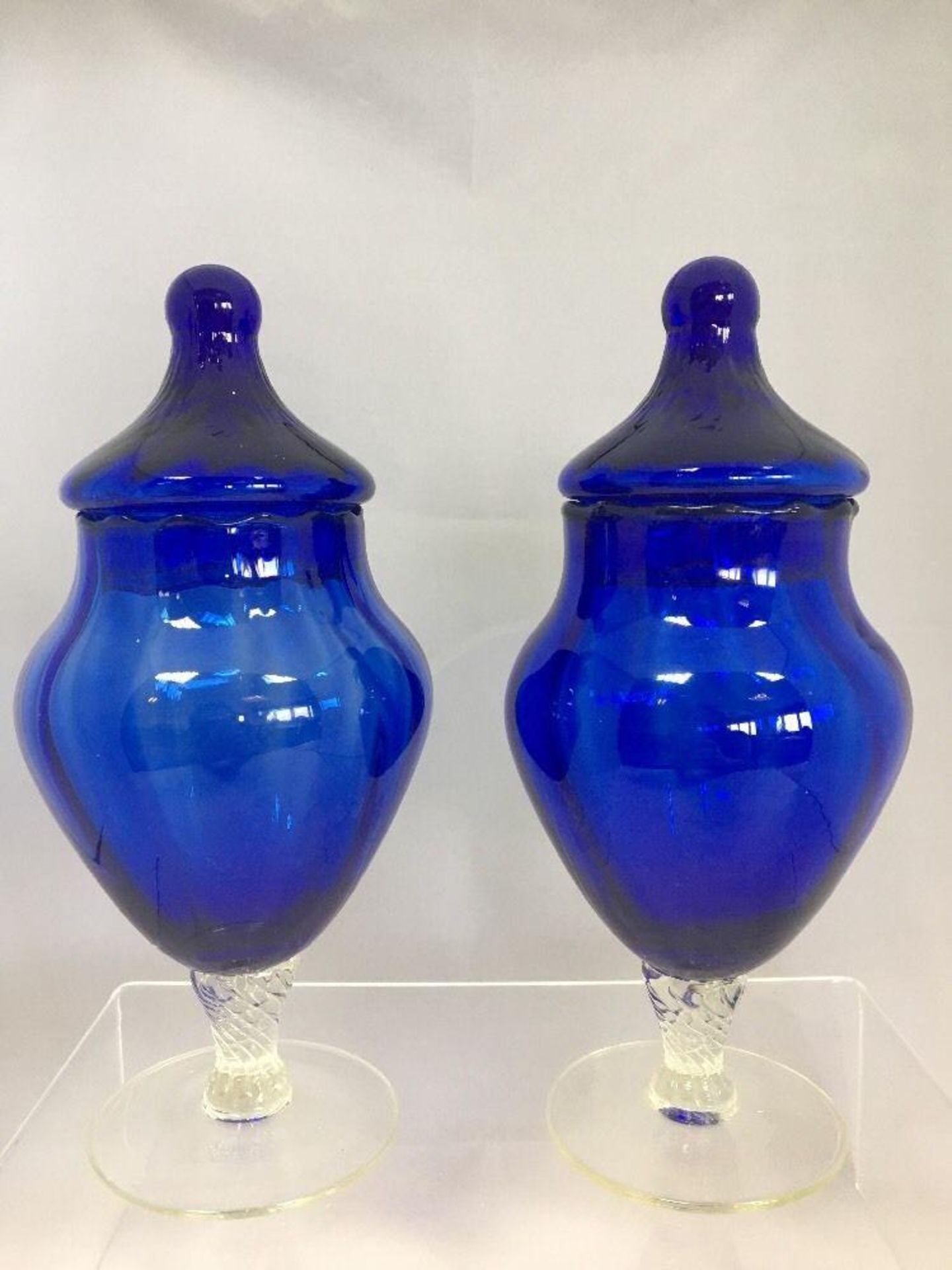 Pair of Antique Bristol Blue Glass Footed Hand Blown Lidded Jars. Both are in excellent condition