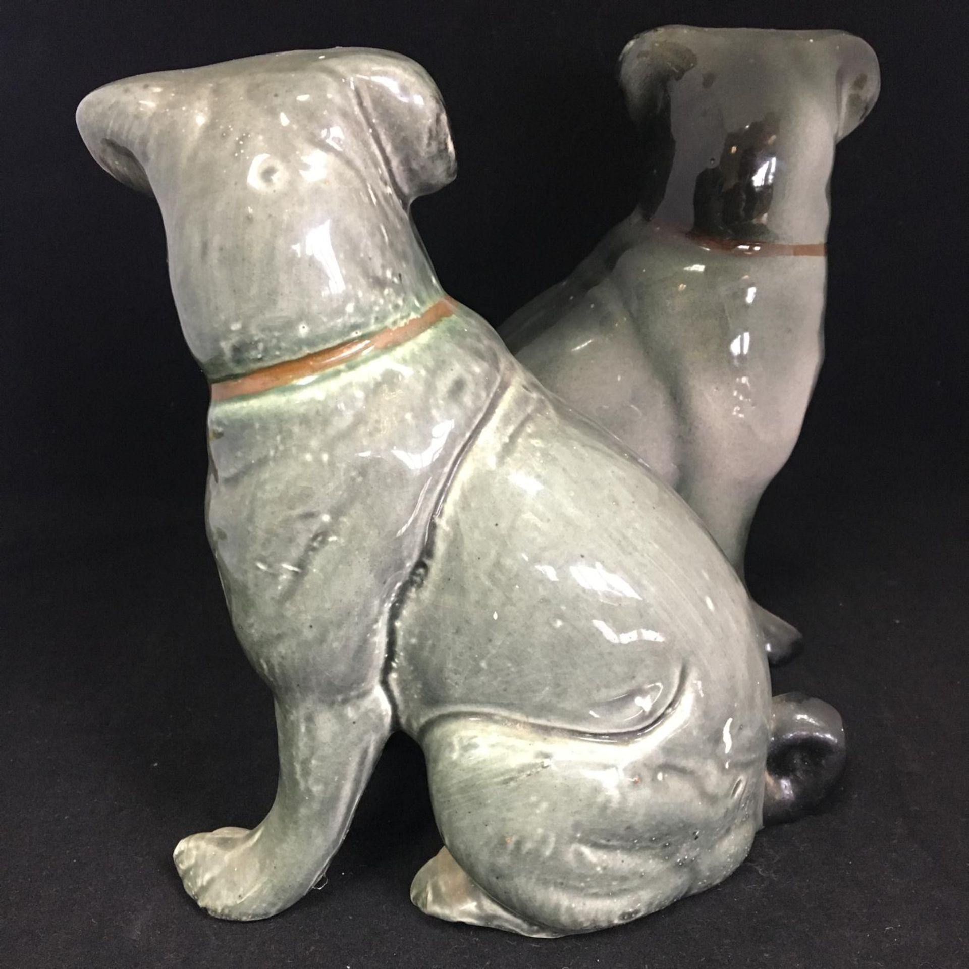 Antique Victorian era ceramic seated pugs. Matched (not an exact pair). Standing around 20cm high. - Image 3 of 6